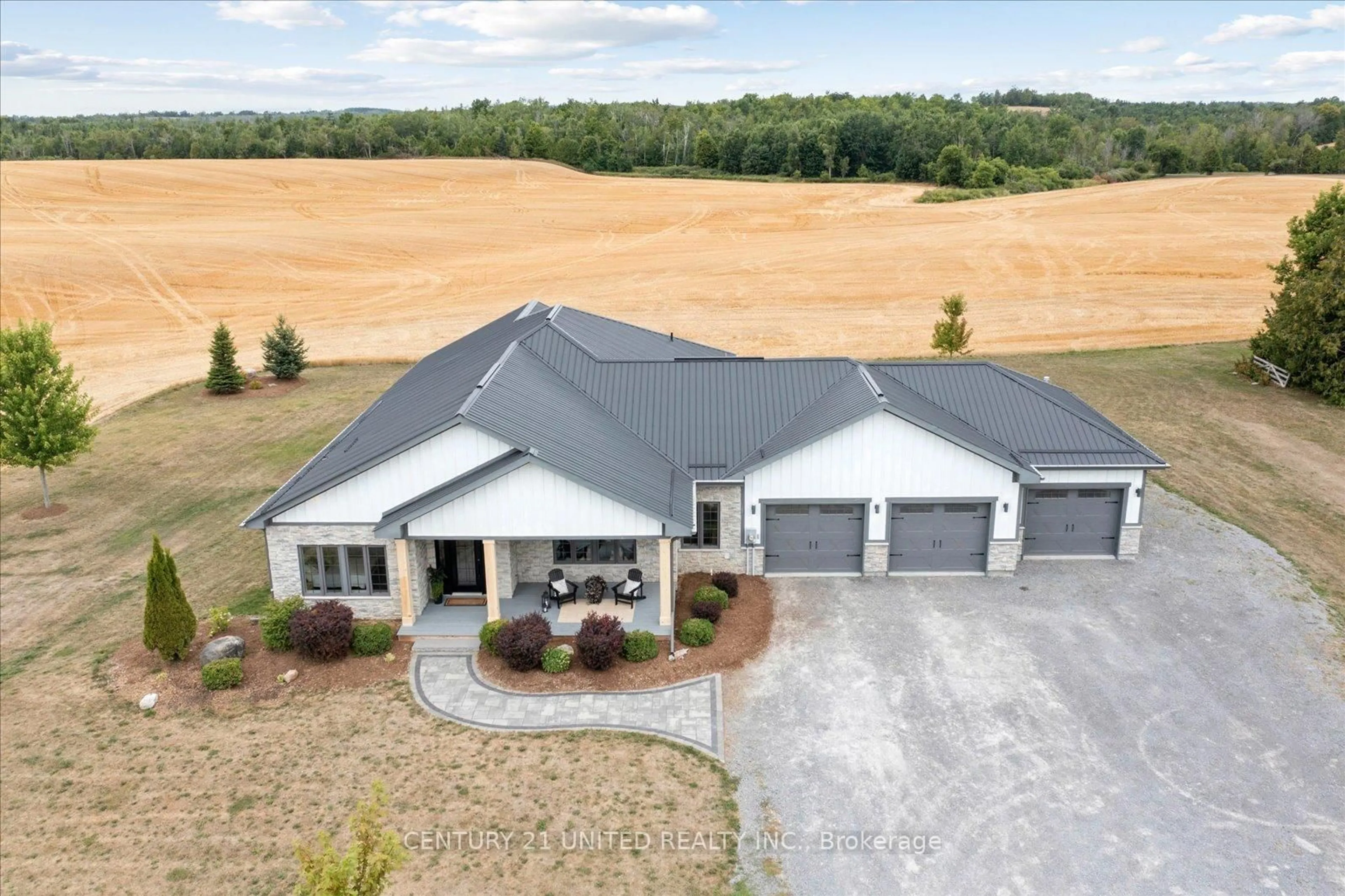 A pic from outside/outdoor area/front of a property/back of a property/a pic from drone, unknown for 3084 Base Line, Otonabee-South Monaghan Ontario K0L 2G0