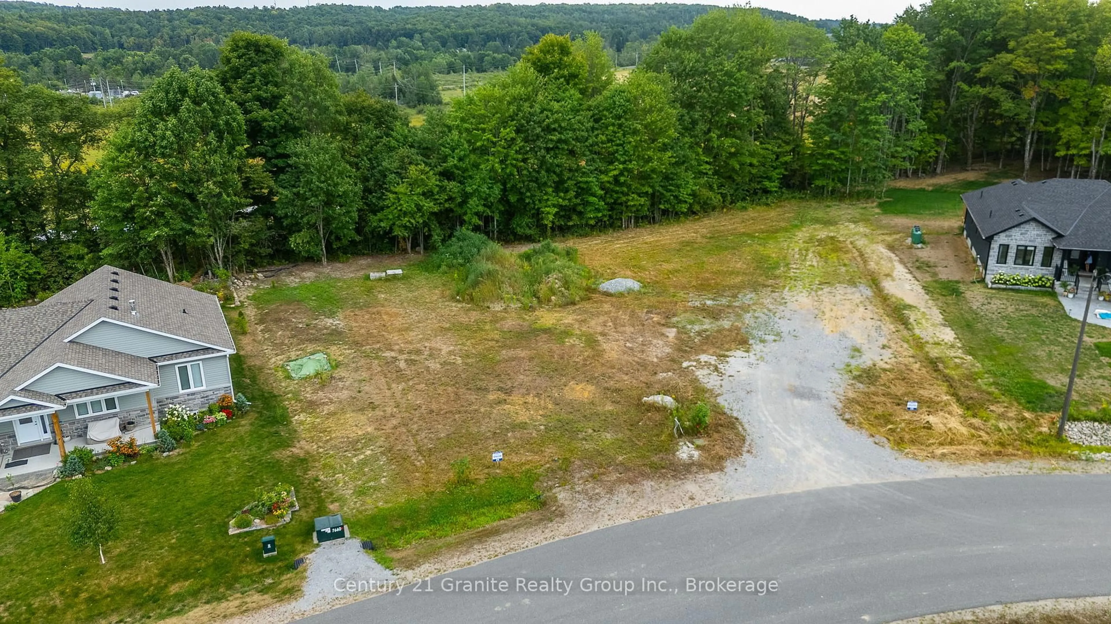 A pic from outside/outdoor area/front of a property/back of a property/a pic from drone, water/lake/river/ocean view for 50 Windover Dr, Minden Hills Ontario K0M 2K0
