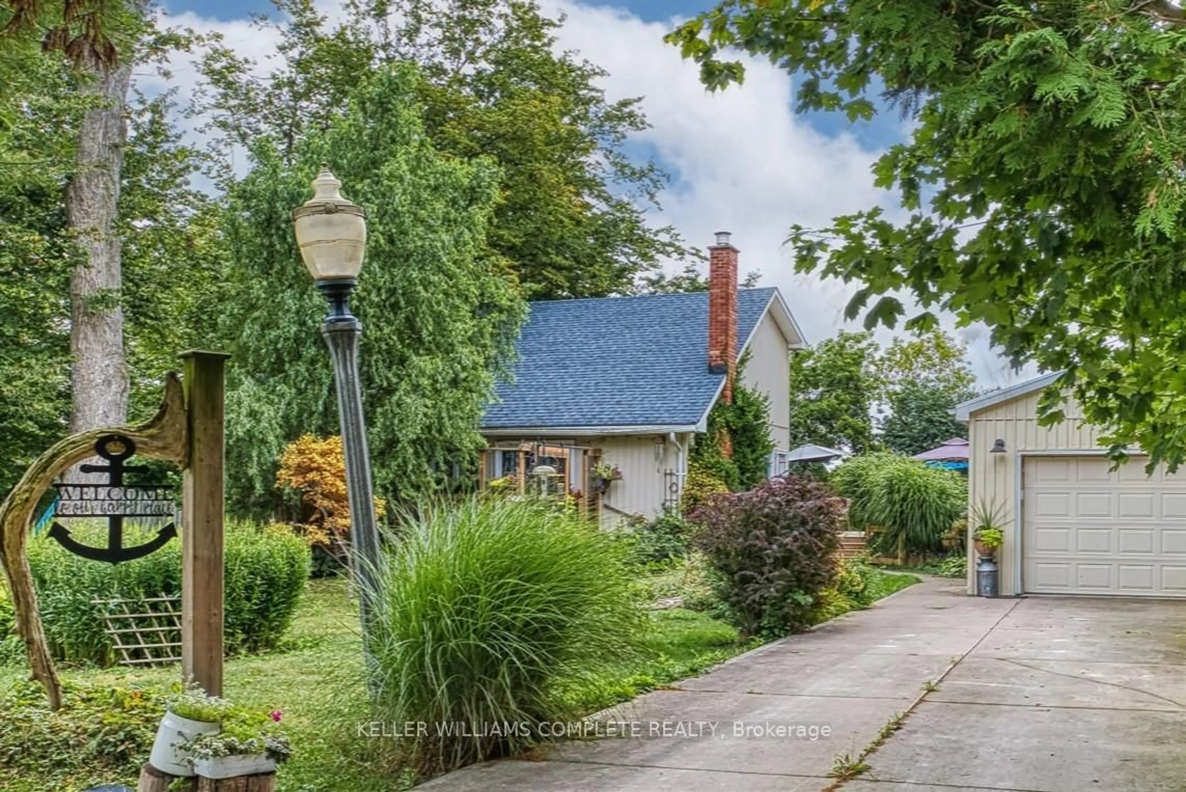 A pic from outside/outdoor area/front of a property/back of a property/a pic from drone, street for 74434 Woodland Dr, Bluewater Ontario N0M 1G0