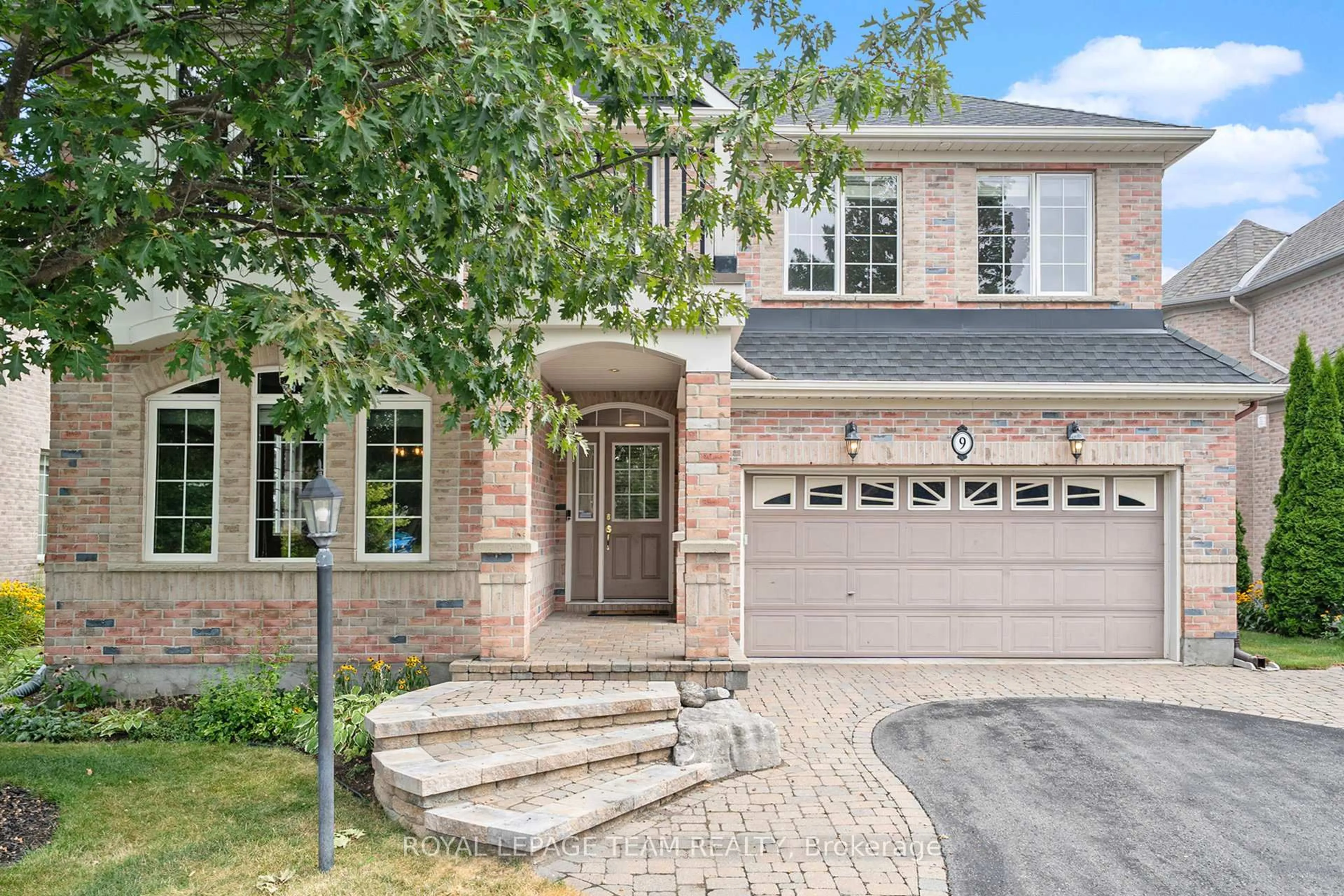 Home with brick exterior material, street for 9 Fencerow Way, Nepean Ontario K2J 4X8