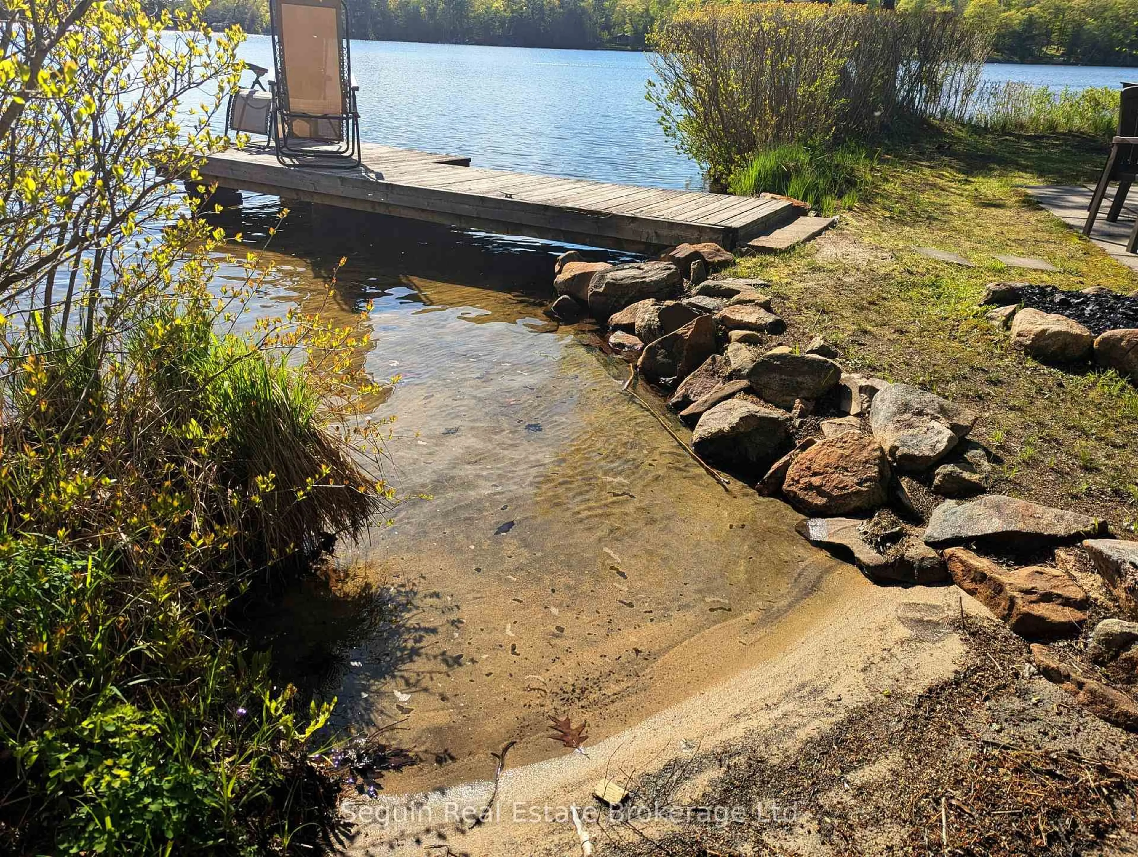 A pic from outside/outdoor area/front of a property/back of a property/a pic from drone, water/lake/river/ocean view for 199a Sugar Lake Road  Seguin Twp, Seguin Ontario P2A 0B6