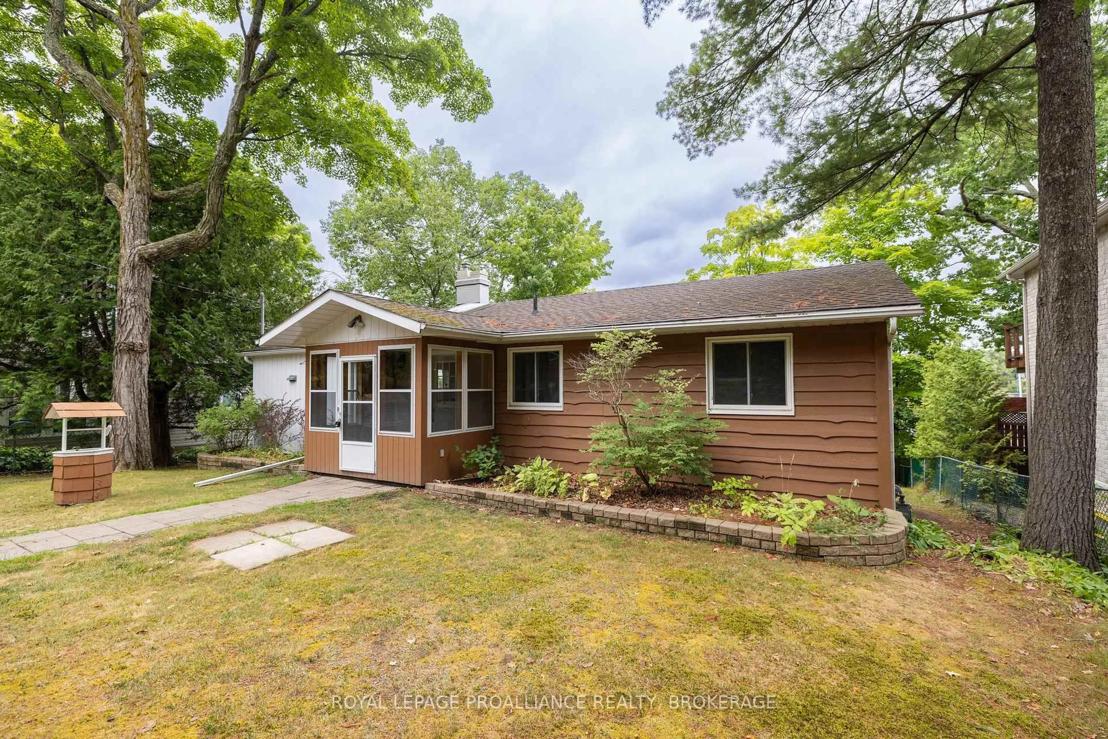Home with vinyl exterior material, street for 314 Nicholson Point Rd, Bath Ontario K0H 1G0