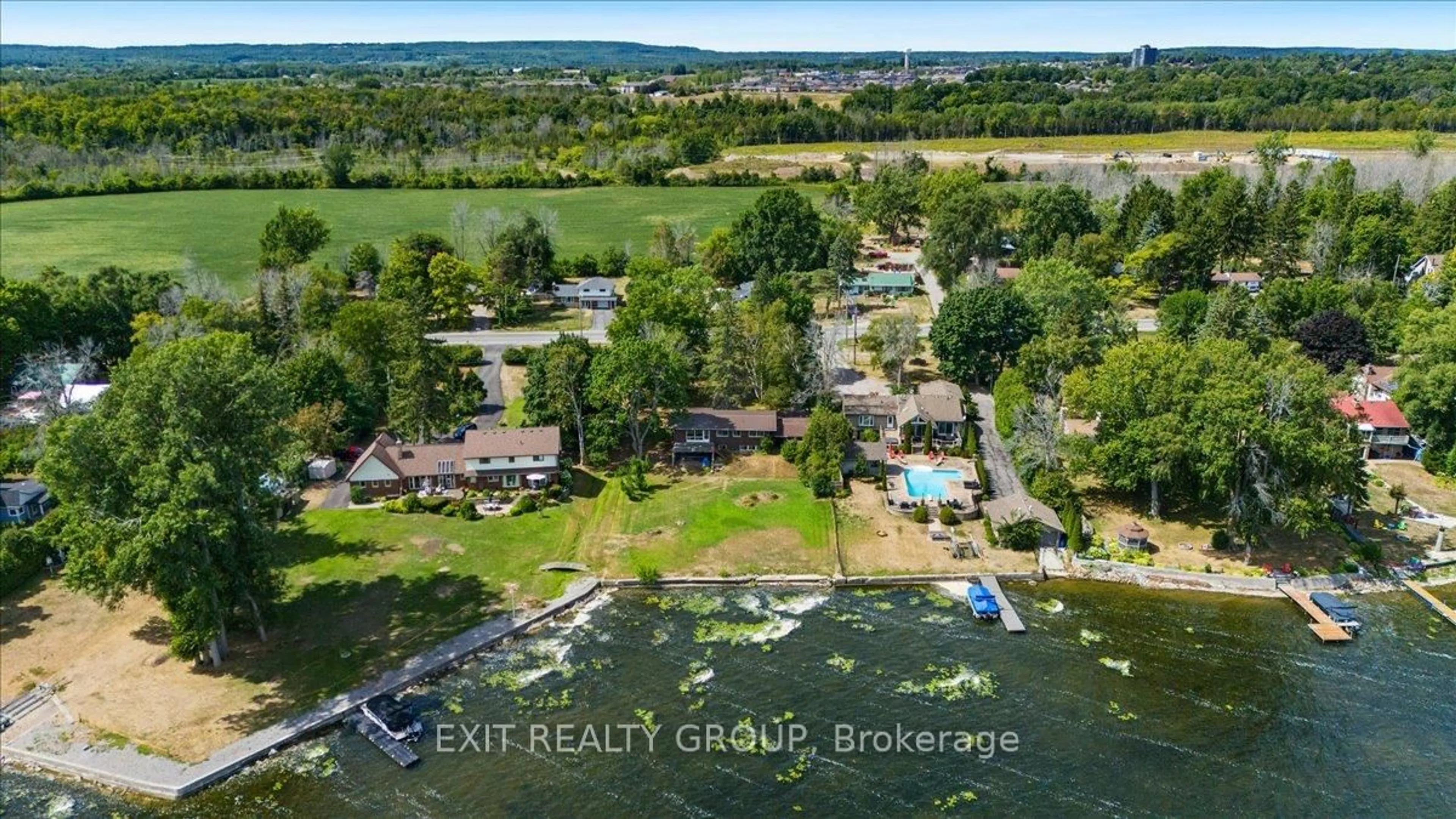 A pic from outside/outdoor area/front of a property/back of a property/a pic from drone, water/lake/river/ocean view for 22649 Loyalist Pkwy, Trenton Ontario K8V 5P7