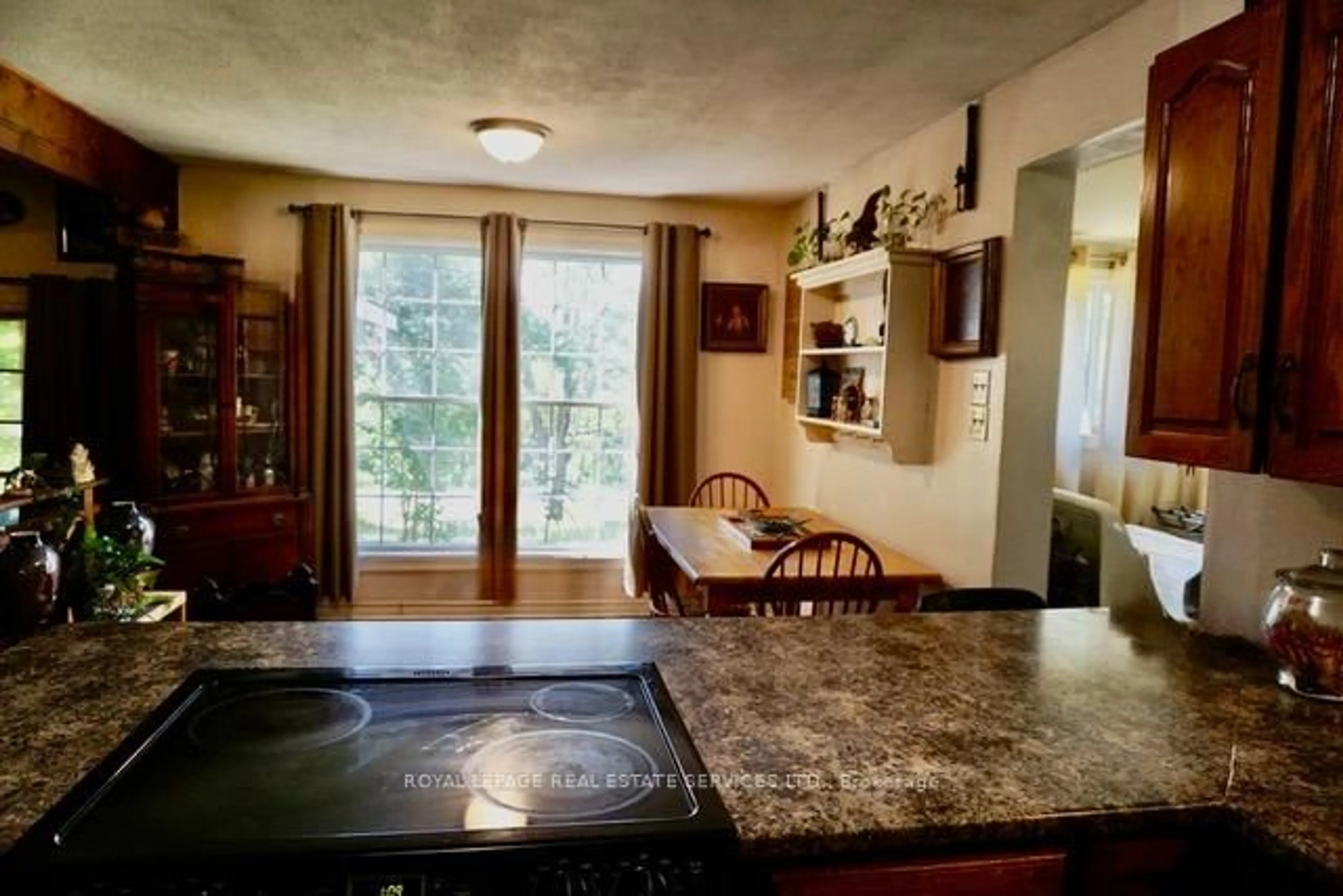 Open concept kitchen, ceramic/tile floor for 1116 Moon River Rd, Muskoka Lakes Ontario P0C 1A0