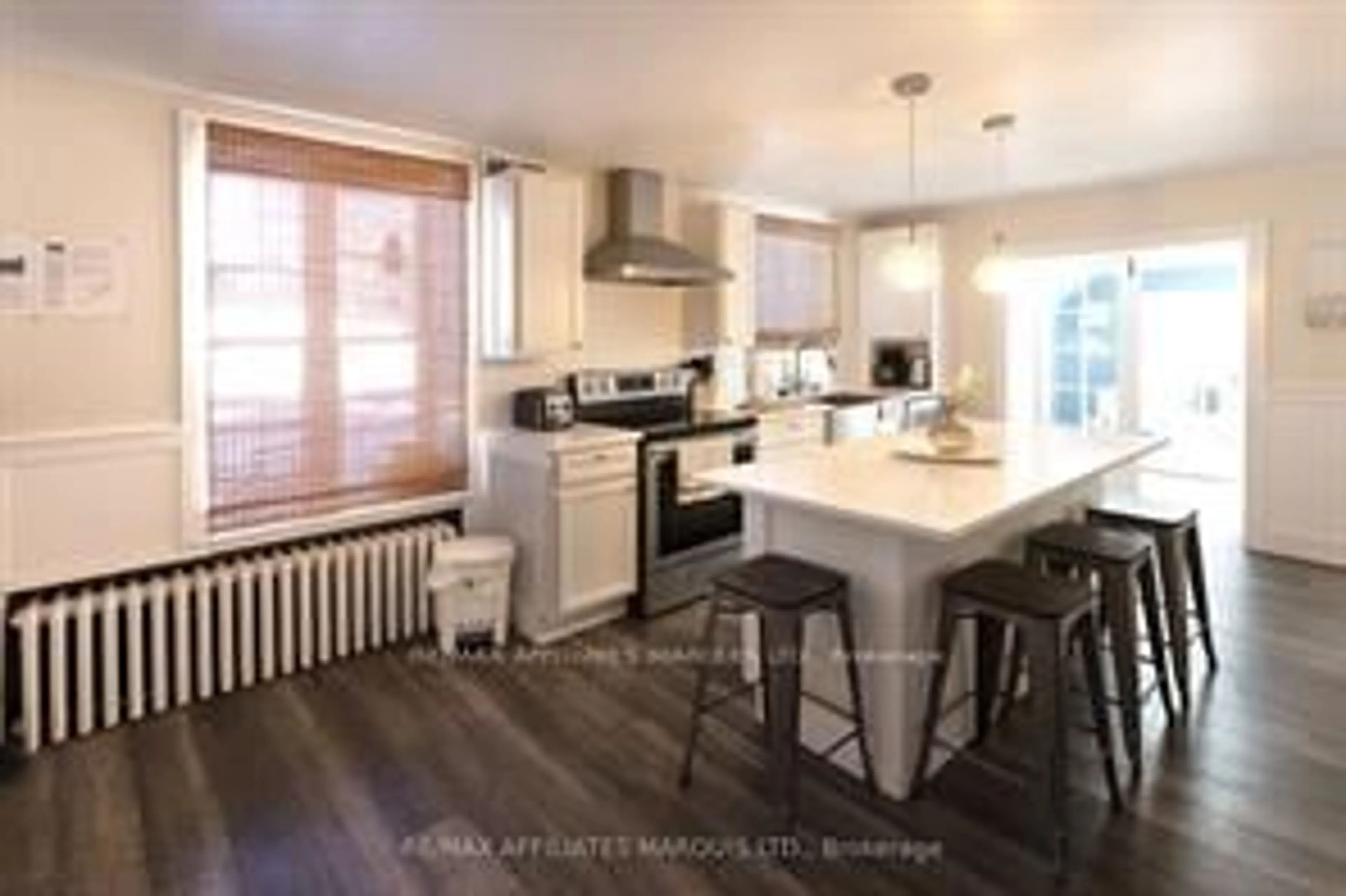Open concept kitchen, wood/laminate floor for 16 Lakeshore Dr, South Dundas Ontario K0C 1X0