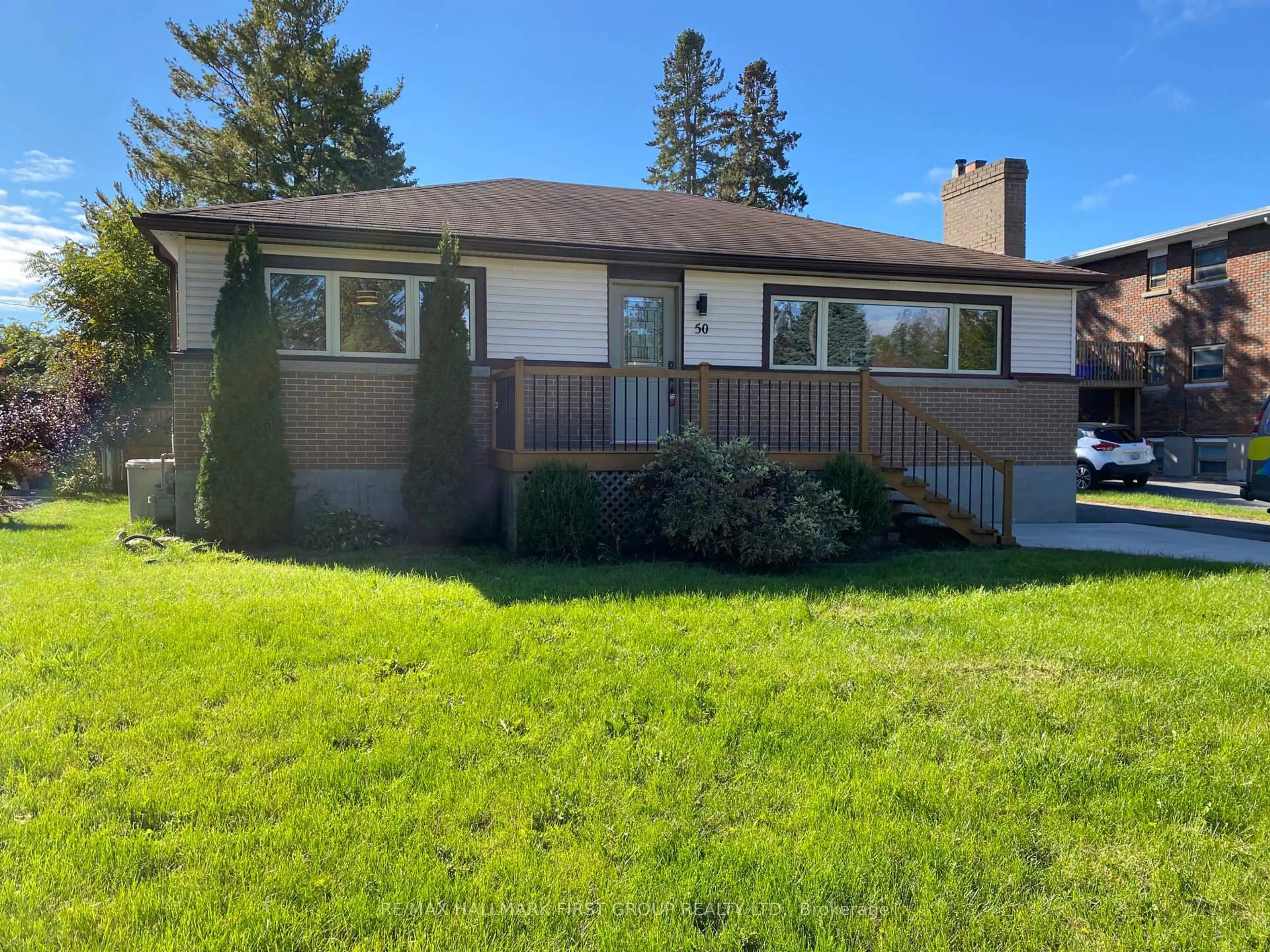Home with vinyl exterior material, street for 50 Champlain Ave, Kingston Ontario K7M 3K8
