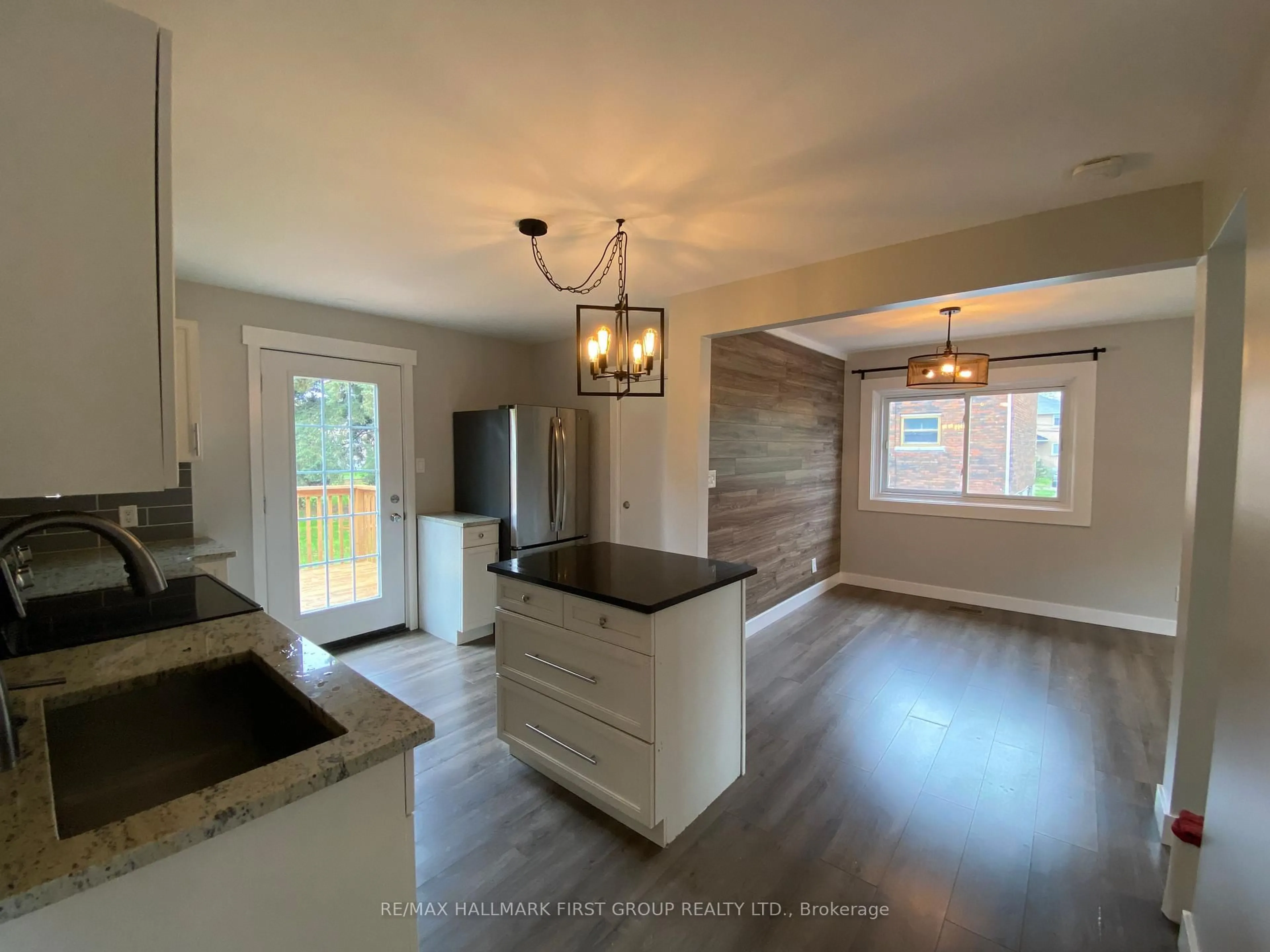 Open concept kitchen, wood/laminate floor for 50 Champlain Ave, Kingston Ontario K7M 3K8
