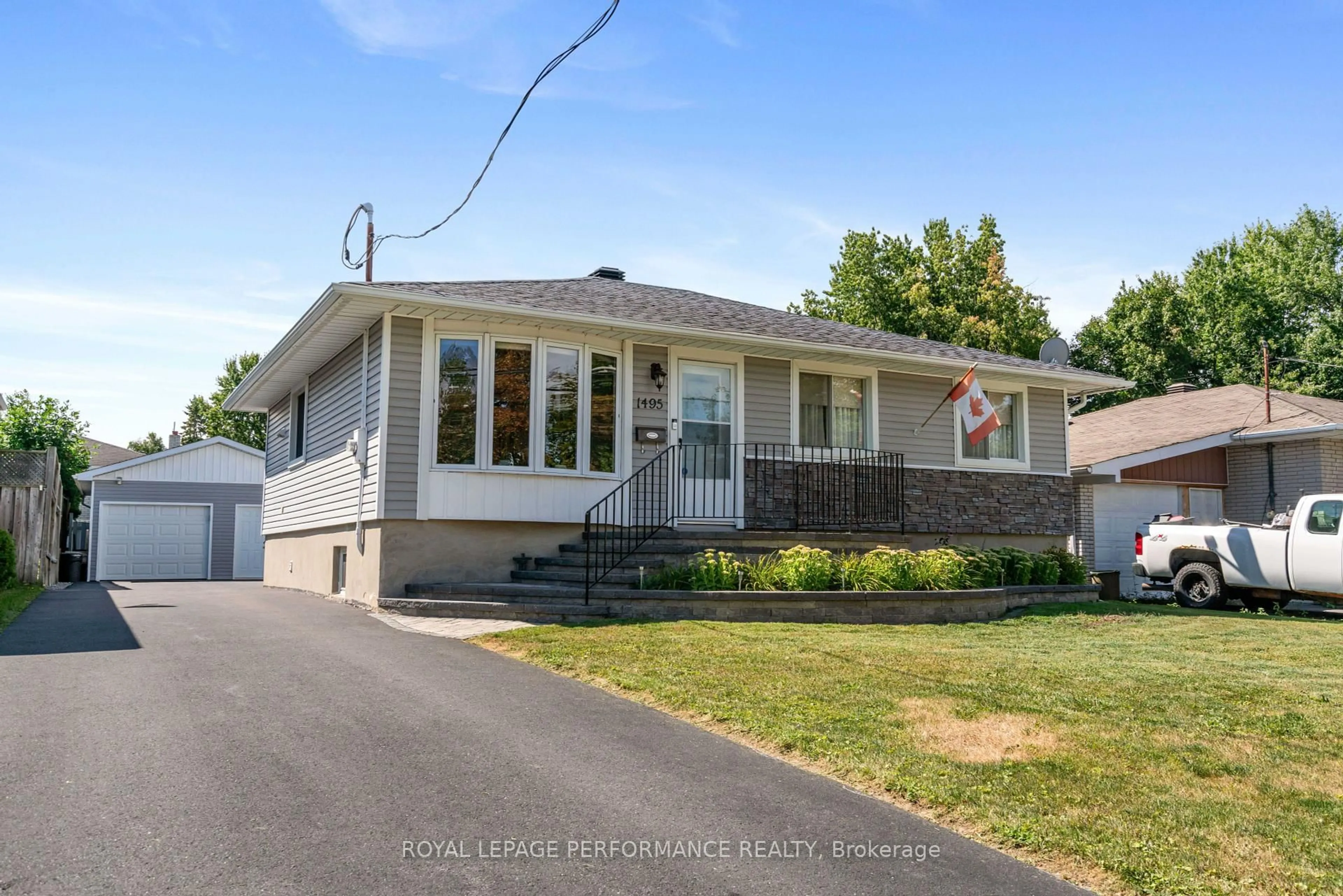 Home with vinyl exterior material, street for 1495 Holy Cross Blvd, Cornwall Ontario K6H 2W9
