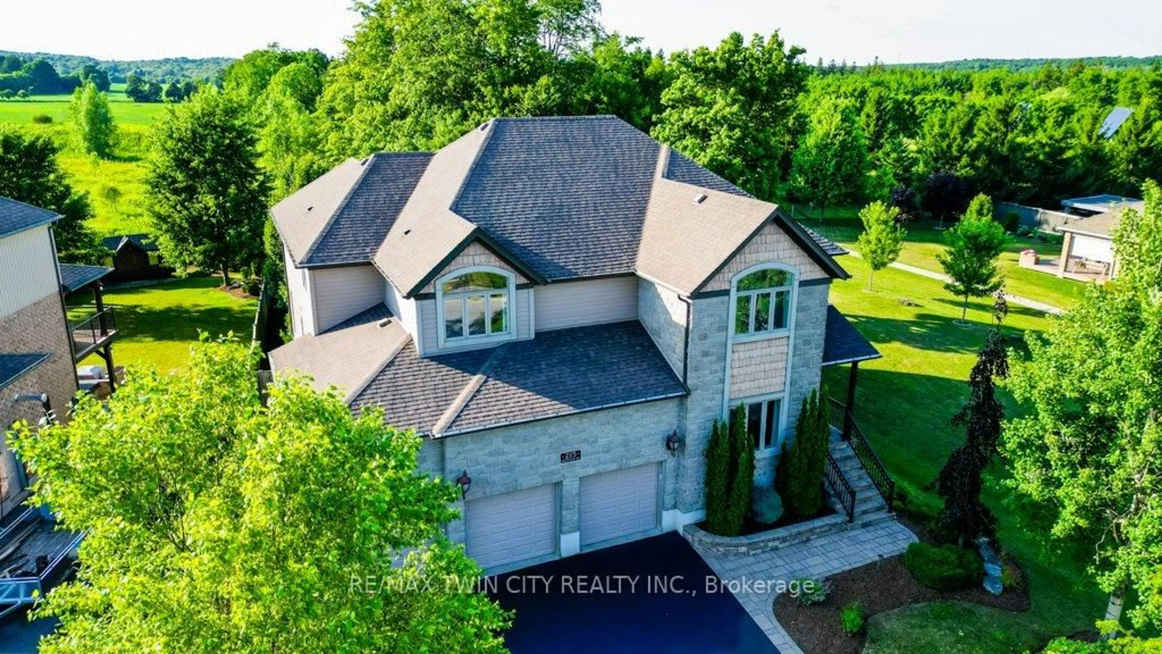 A pic from outside/outdoor area/front of a property/back of a property/a pic from drone, unknown for 215 Hostetler Rd, Wilmot Ontario N3A 0B1