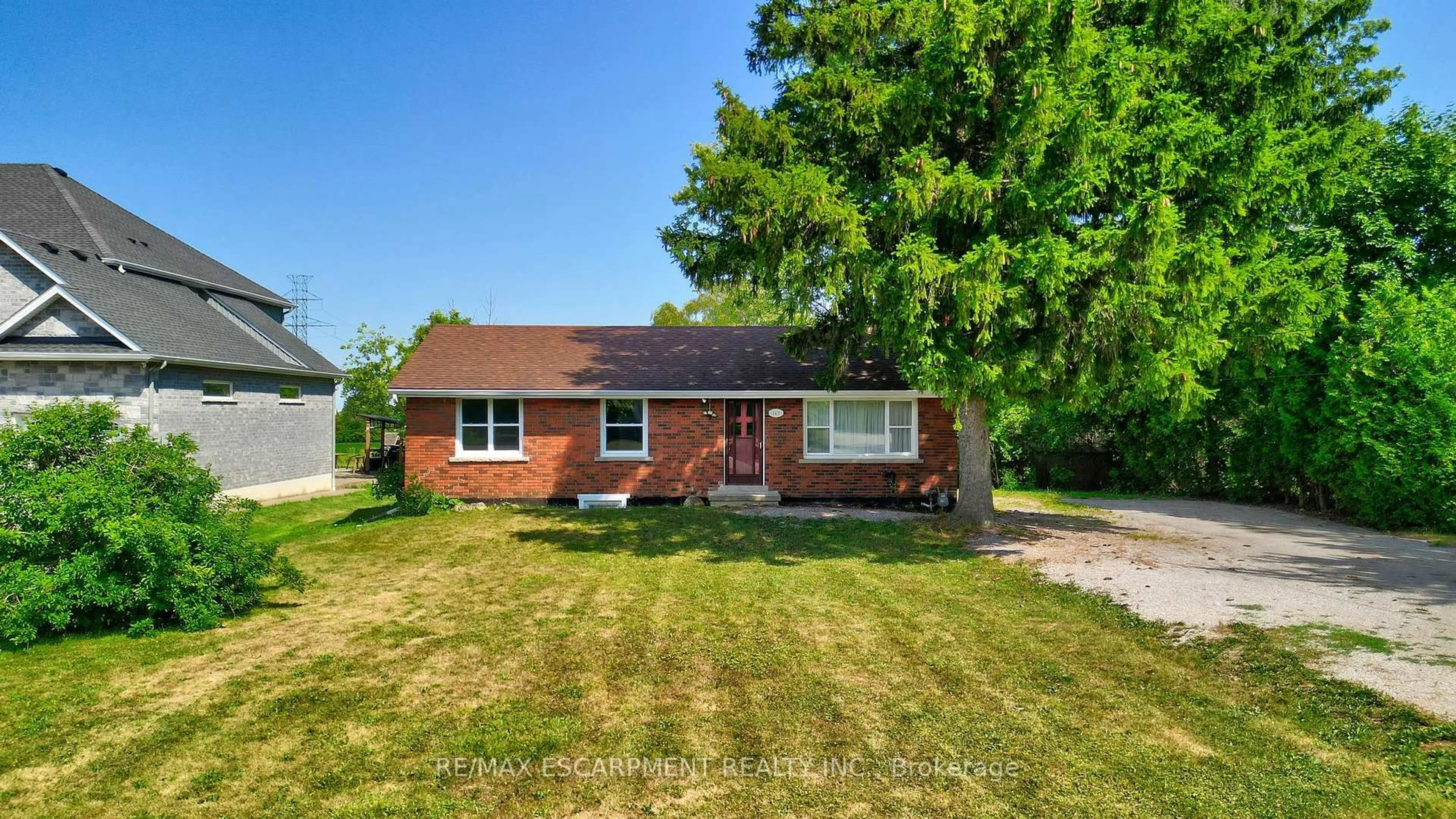 Home with brick exterior material, street for 167 Miles Rd, Hamilton Ontario L8W 1E2