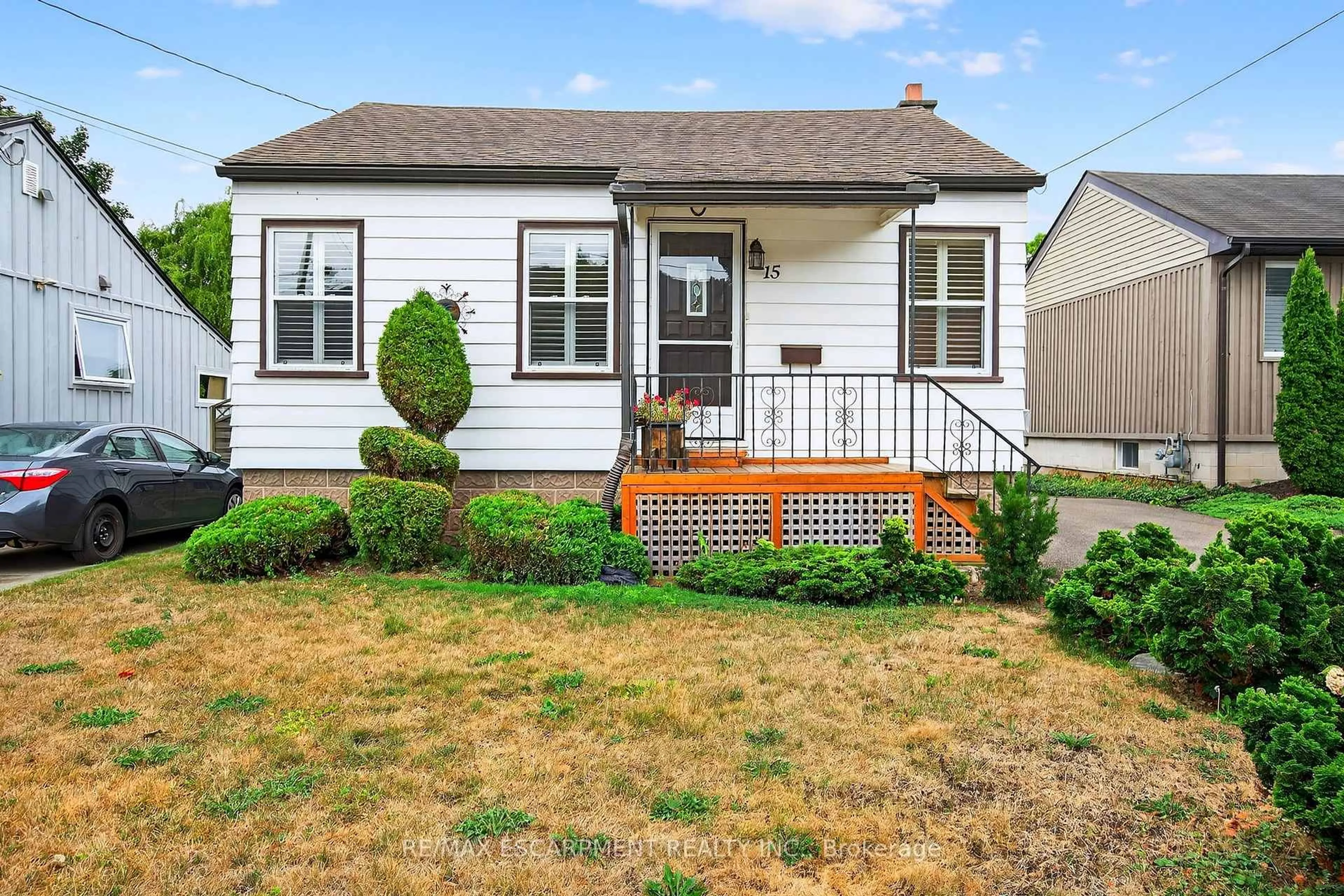 Home with vinyl exterior material, street for 15 Donald Ave, Hamilton Ontario L9H 1E9