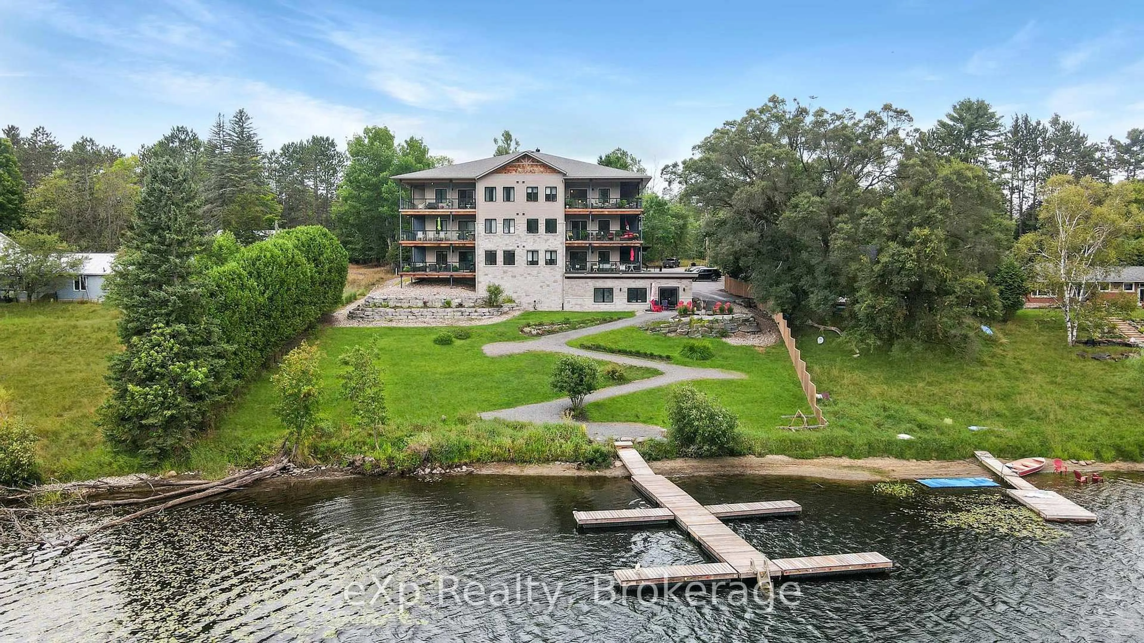 A pic from outside/outdoor area/front of a property/back of a property/a pic from drone, water/lake/river/ocean view for 75 Wallings Rd #107, Dysart et al Ontario K0M 1S0