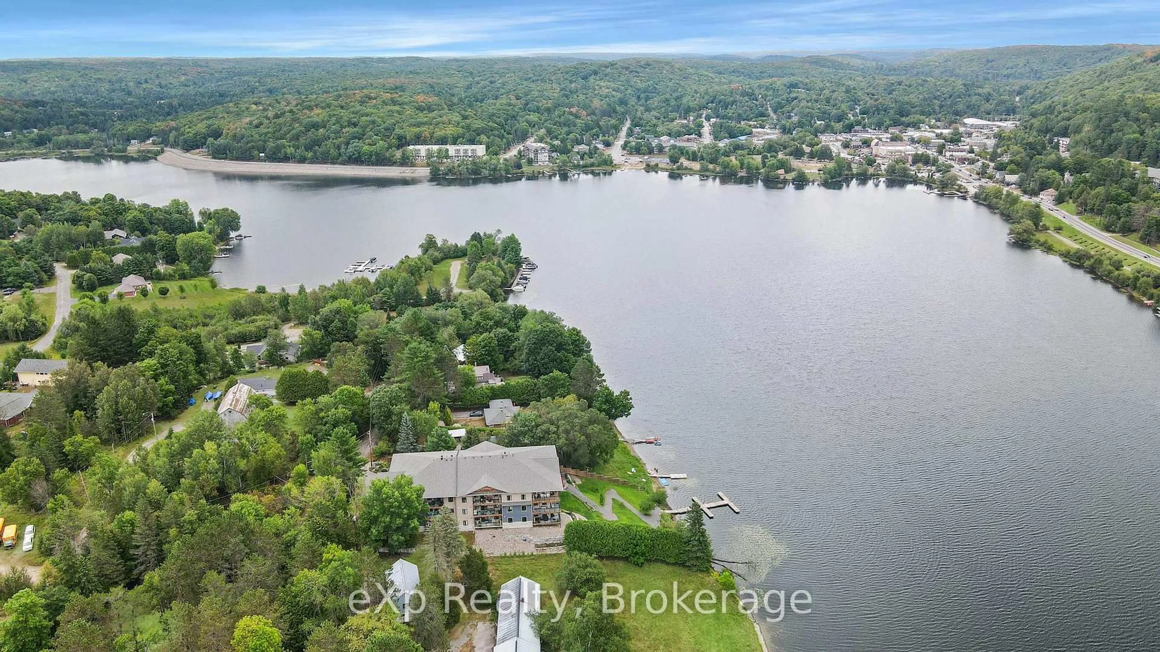 A pic from outside/outdoor area/front of a property/back of a property/a pic from drone, water/lake/river/ocean view for 75 Wallings Rd #107, Dysart et al Ontario K0M 1S0
