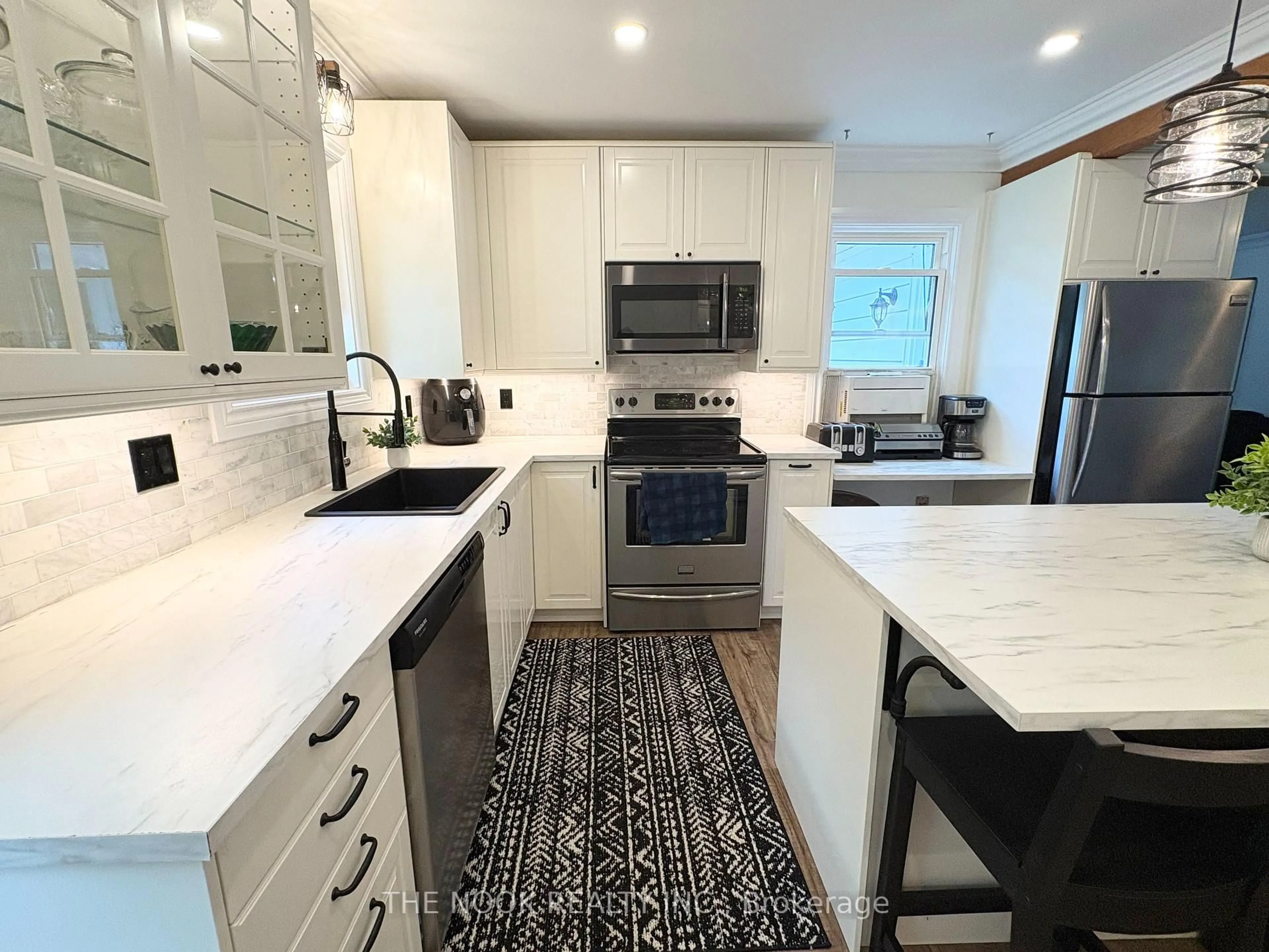 Open concept kitchen, ceramic/tile floor for 7598 Rd 509 Rd, Plevna Ontario K0H 2M0