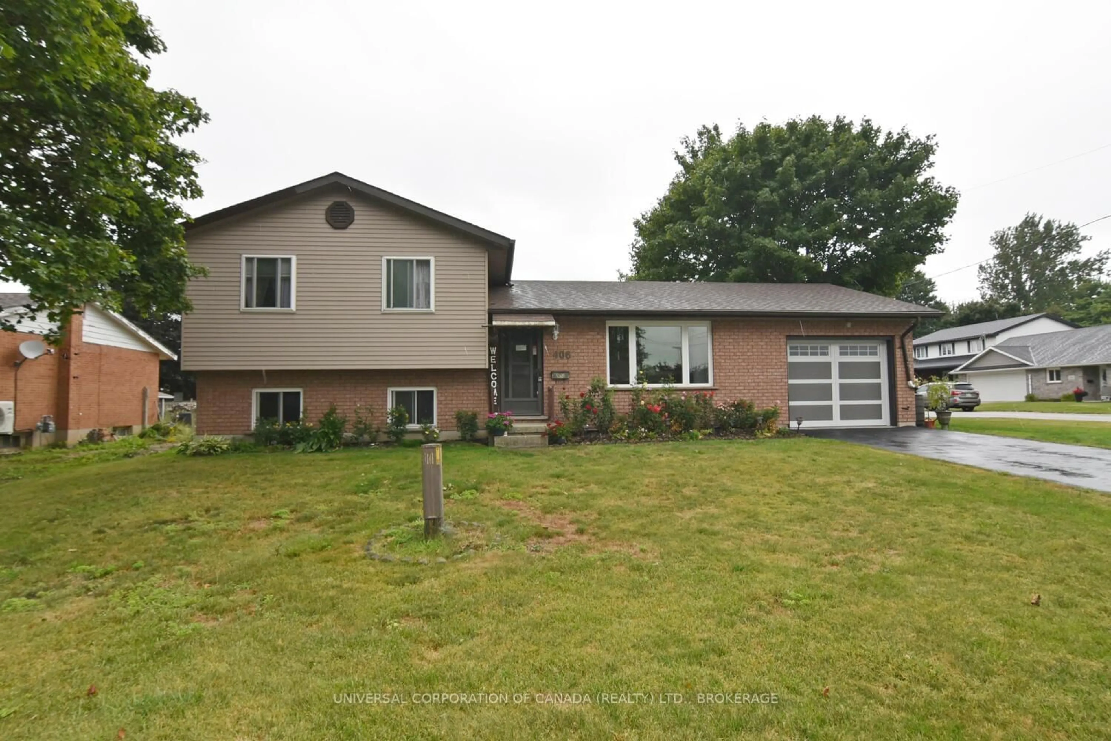 Home with brick exterior material, street for 406 Elm Ave, North Perth Ontario N4W 3G2