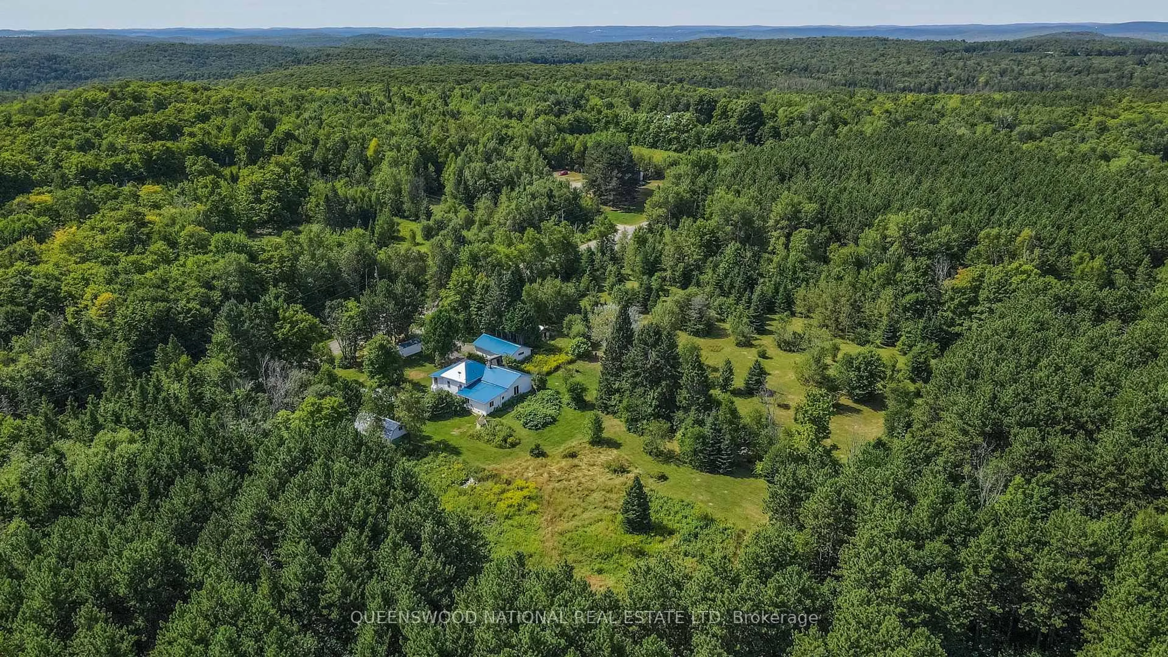 A pic from outside/outdoor area/front of a property/back of a property/a pic from drone, forest/trees view for 842 Centreview Rd, Combermere Ontario K0J 1L0