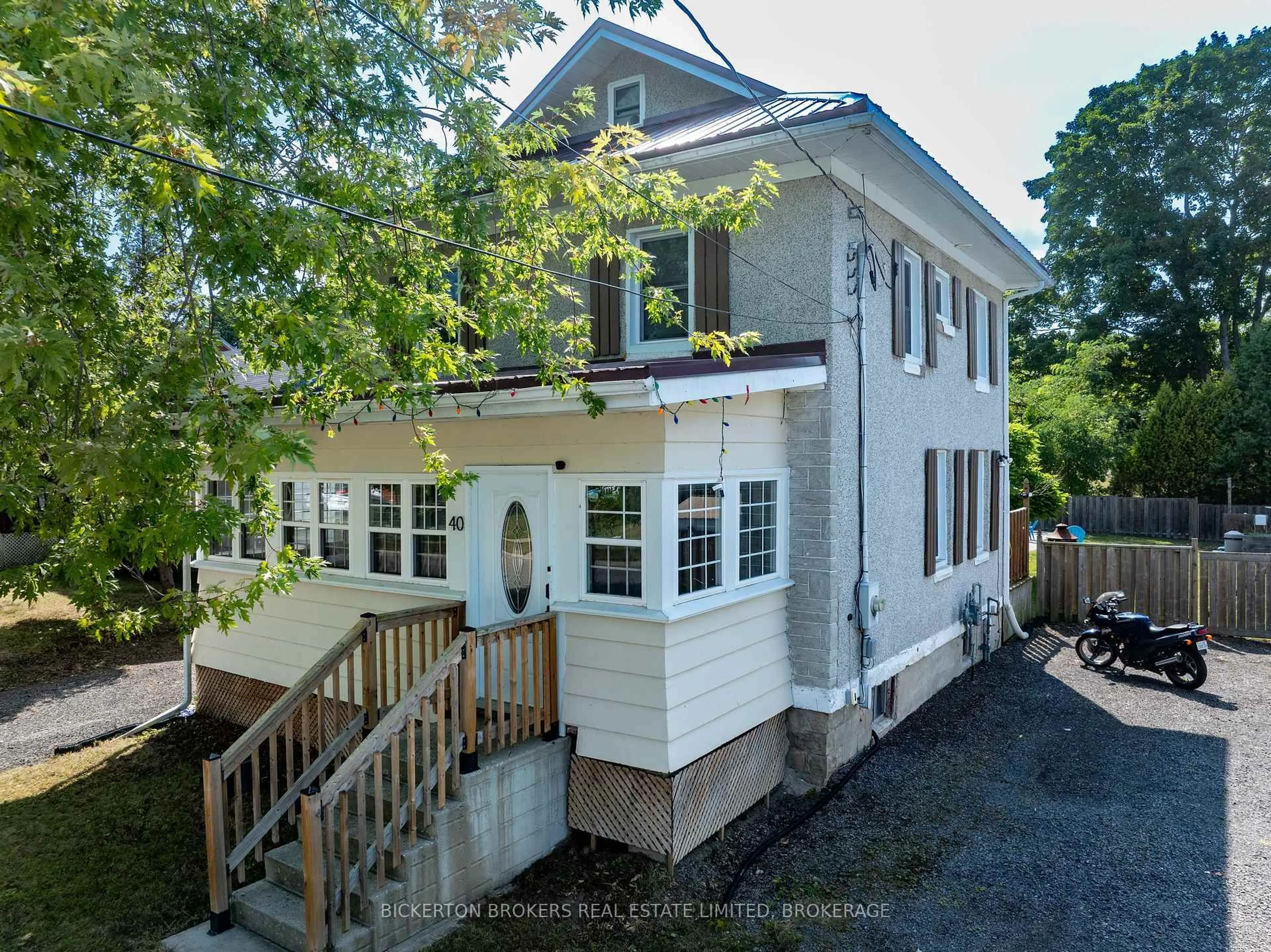 Home with vinyl exterior material, street for 40 Elm St, Gananoque Ontario K7G 2S7