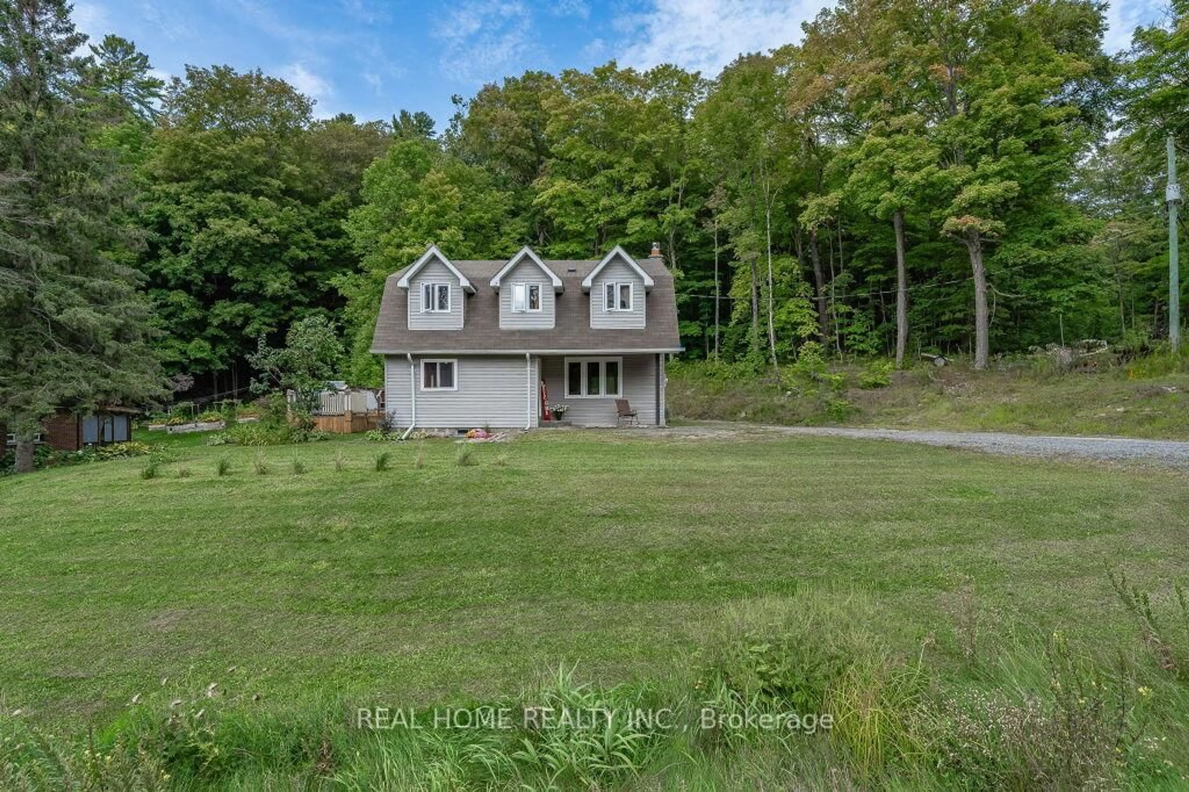 A pic from outside/outdoor area/front of a property/back of a property/a pic from drone, water/lake/river/ocean view for 344 Hwy 518, Seguin Ontario P2A 0B2