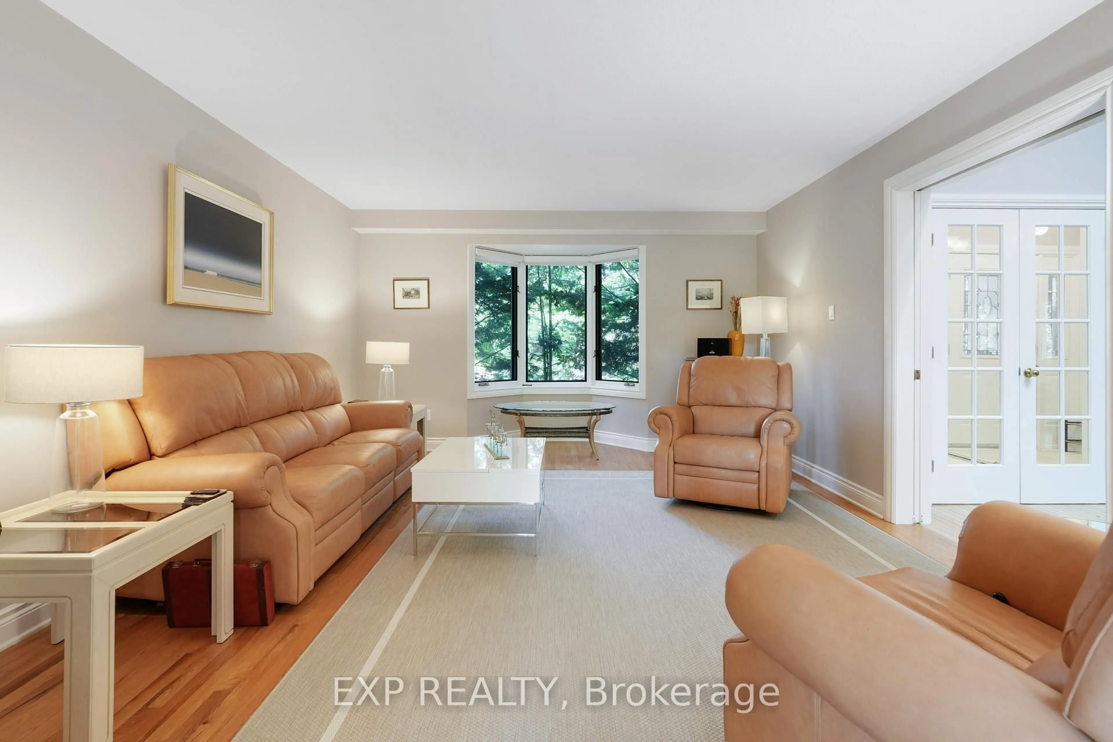 Living room with furniture, ceramic/tile floor for 2106 Lamira St, Ottawa Ontario K1H 8N9