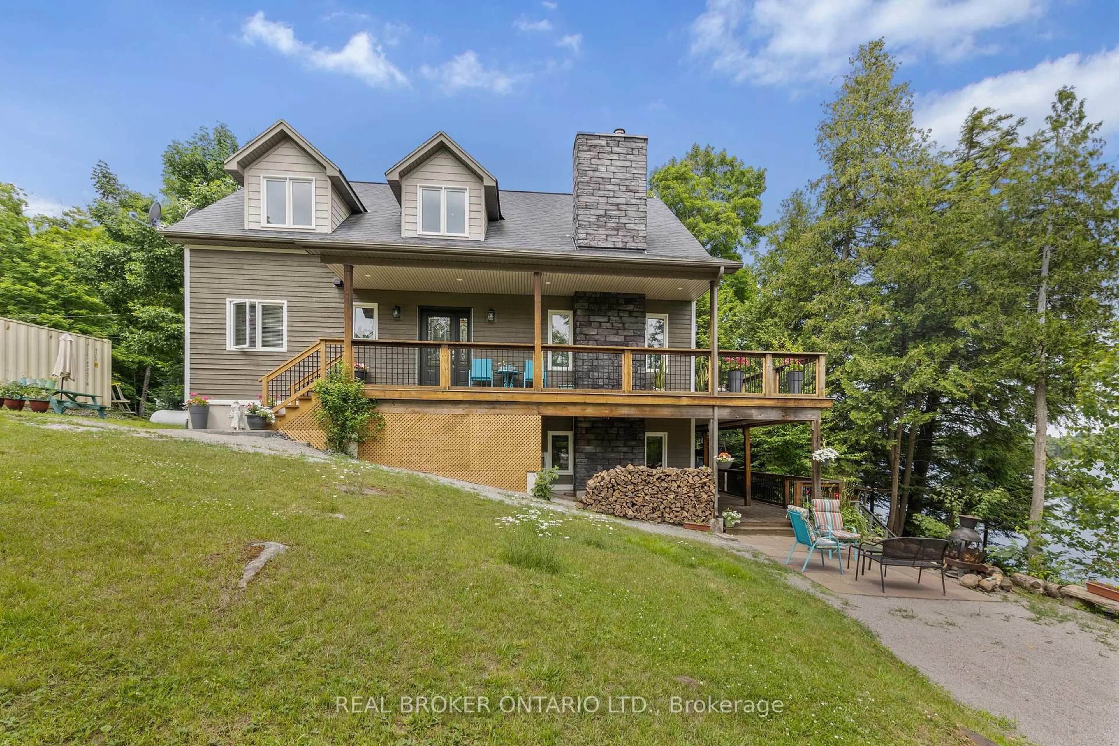 A pic from outside/outdoor area/front of a property/back of a property/a pic from drone, water/lake/river/ocean view for 1 McKowen Rd, McKellar Ontario P0G 1C0