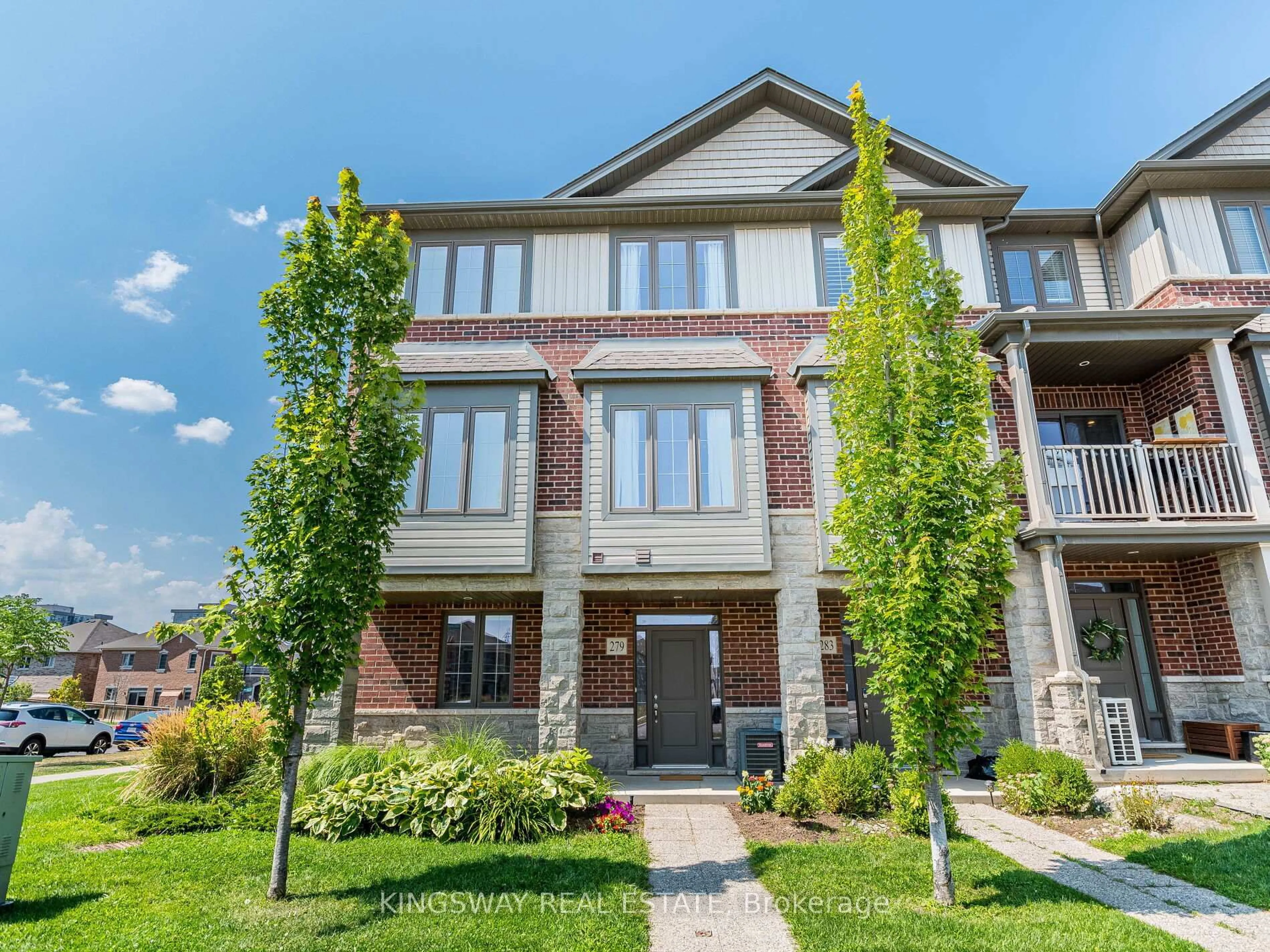 Home with brick exterior material, street for 279 Skinner Rd #2, Hamilton Ontario L8B 1W5