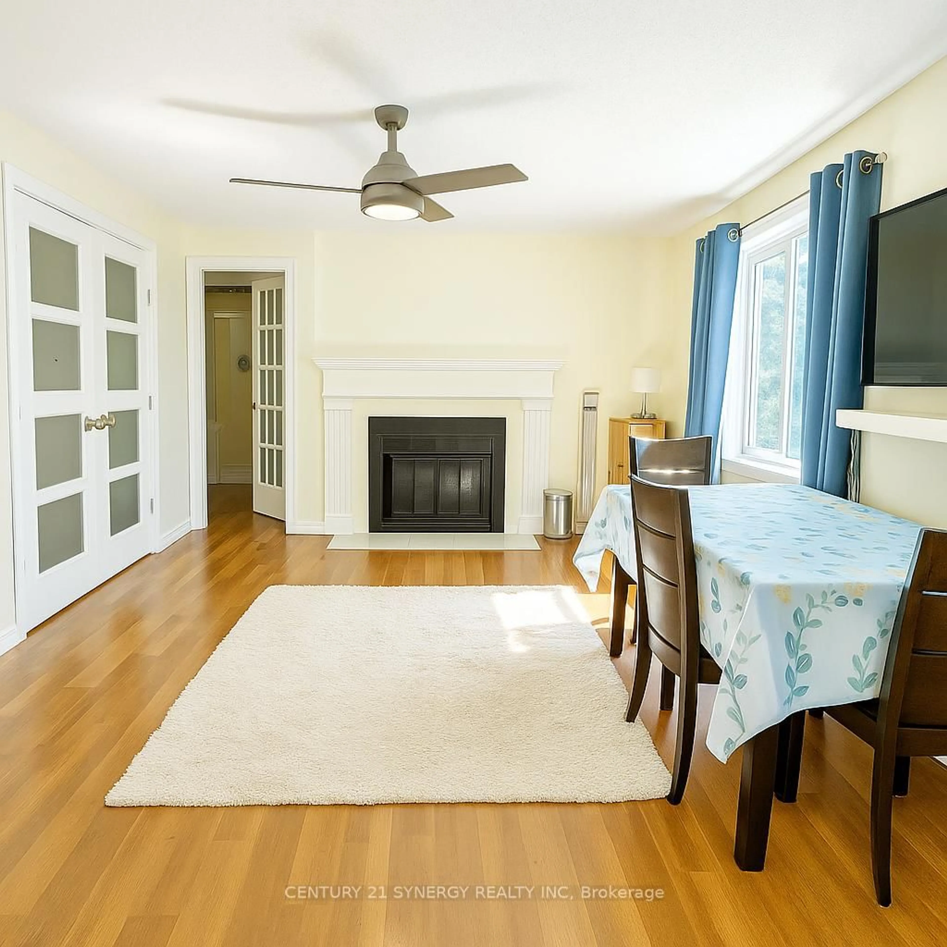 Living room with furniture, wood/laminate floor for 762 St. Andre Dr #5B, Ottawa Ontario K1C 4S7