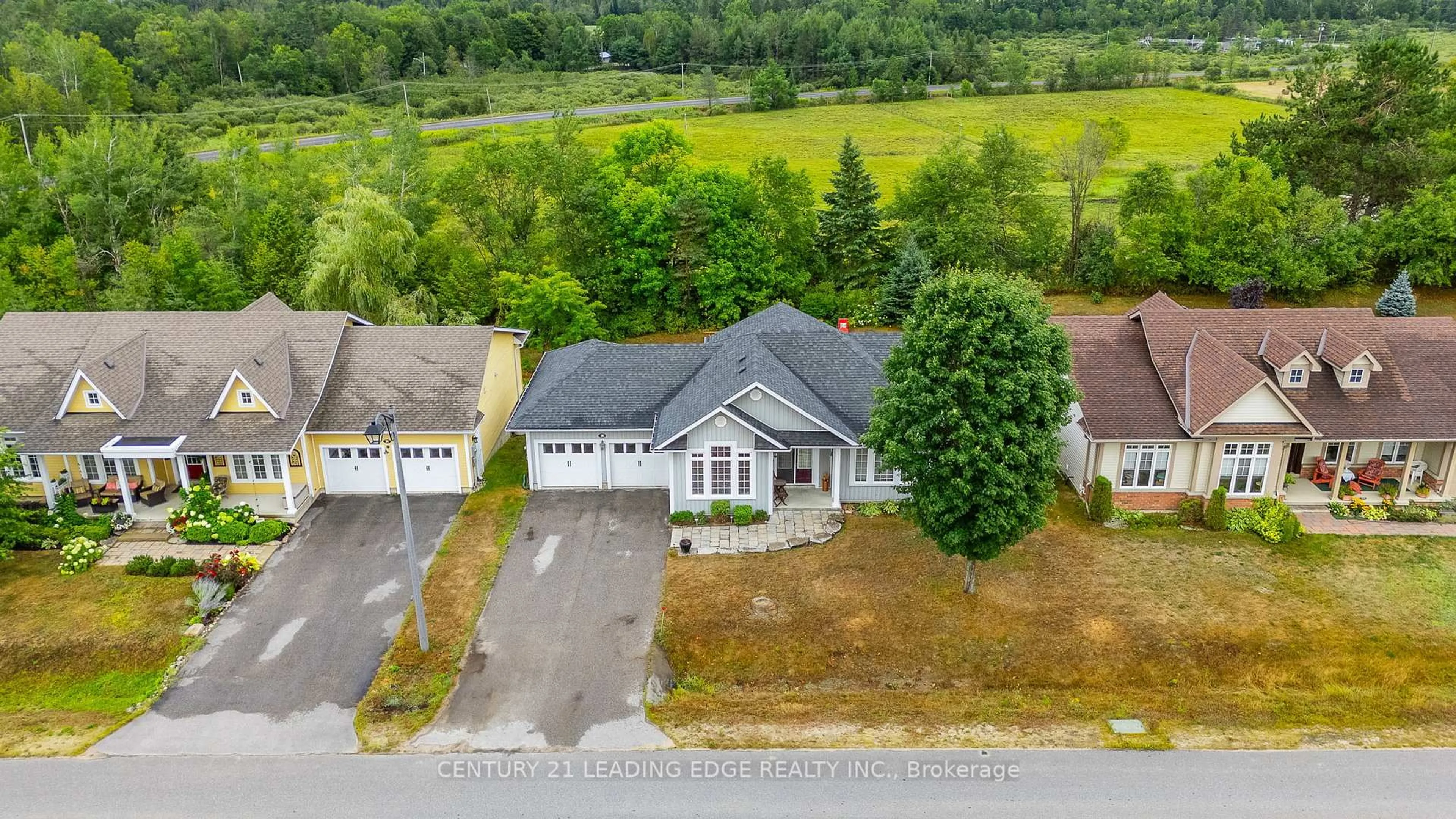 A pic from outside/outdoor area/front of a property/back of a property/a pic from drone, street for 28 Windover Dr, Minden Hills Ontario K0M 2K0