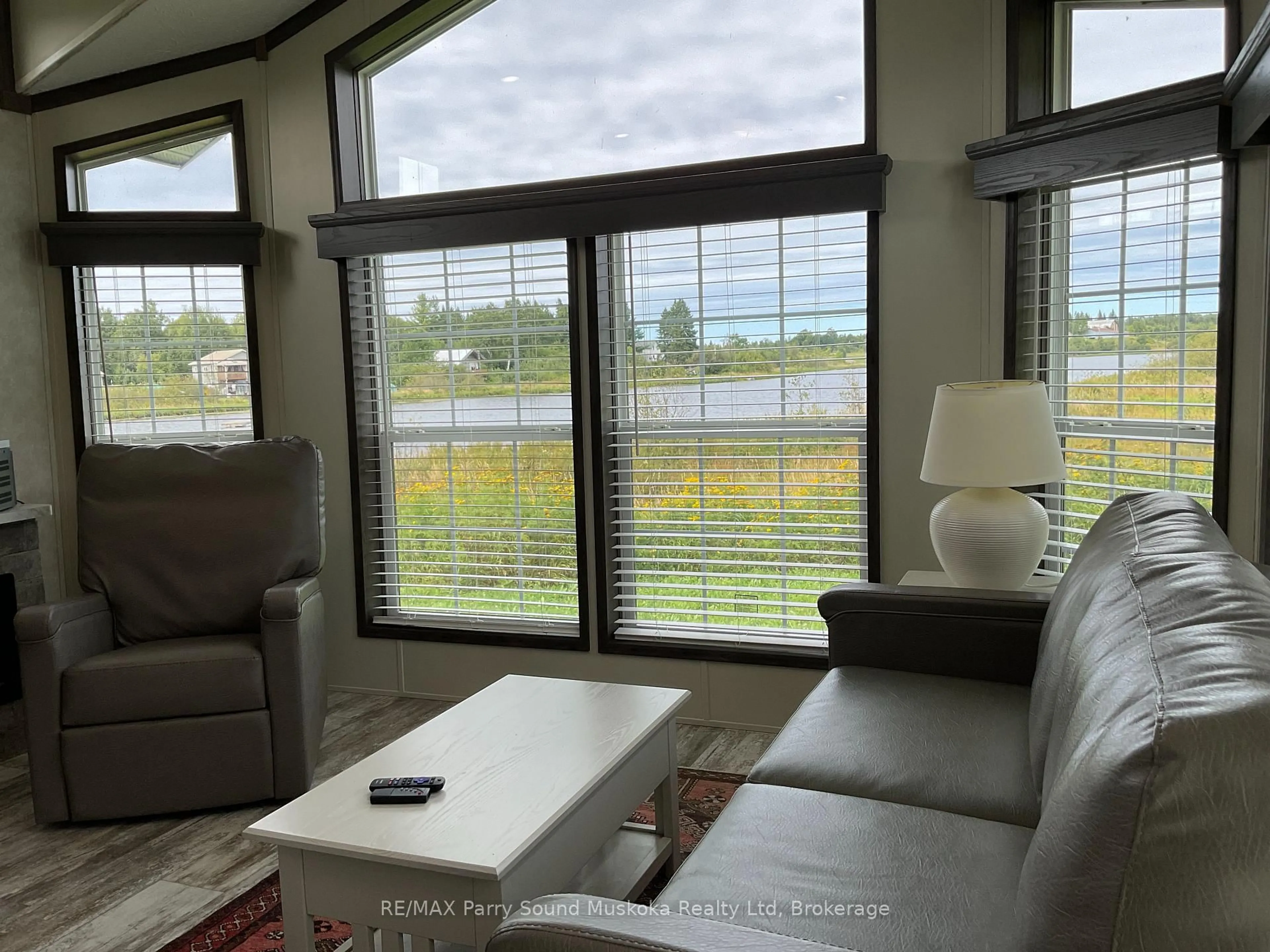 Living room with furniture, unknown for 26 Rupert Rd, Parry Sound Remote Area Ontario P0H 1A0