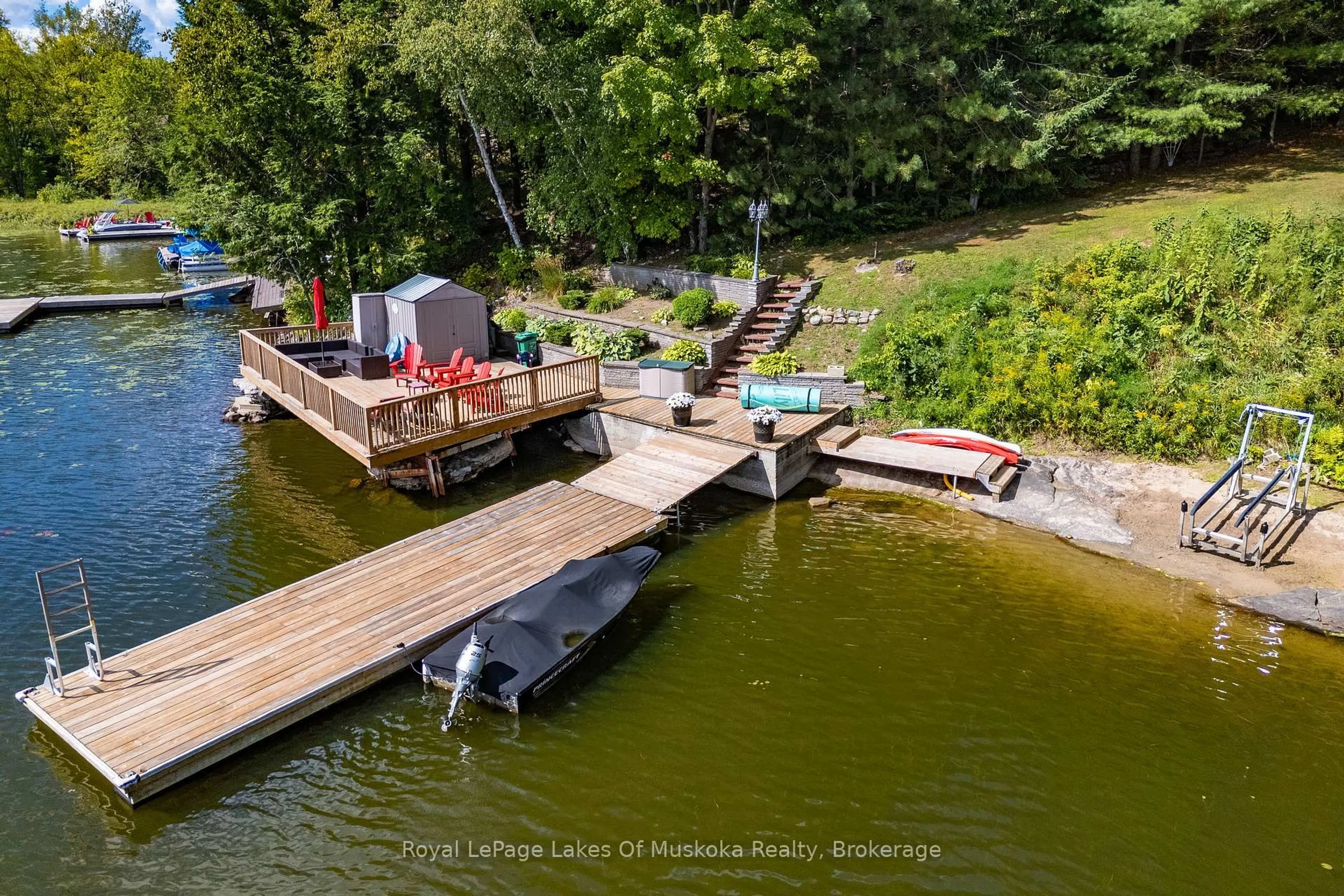 A pic from outside/outdoor area/front of a property/back of a property/a pic from drone, water/lake/river/ocean view for 1023 Carlo Enterprise Rd #16, Muskoka Lakes Ontario P0B 1M0