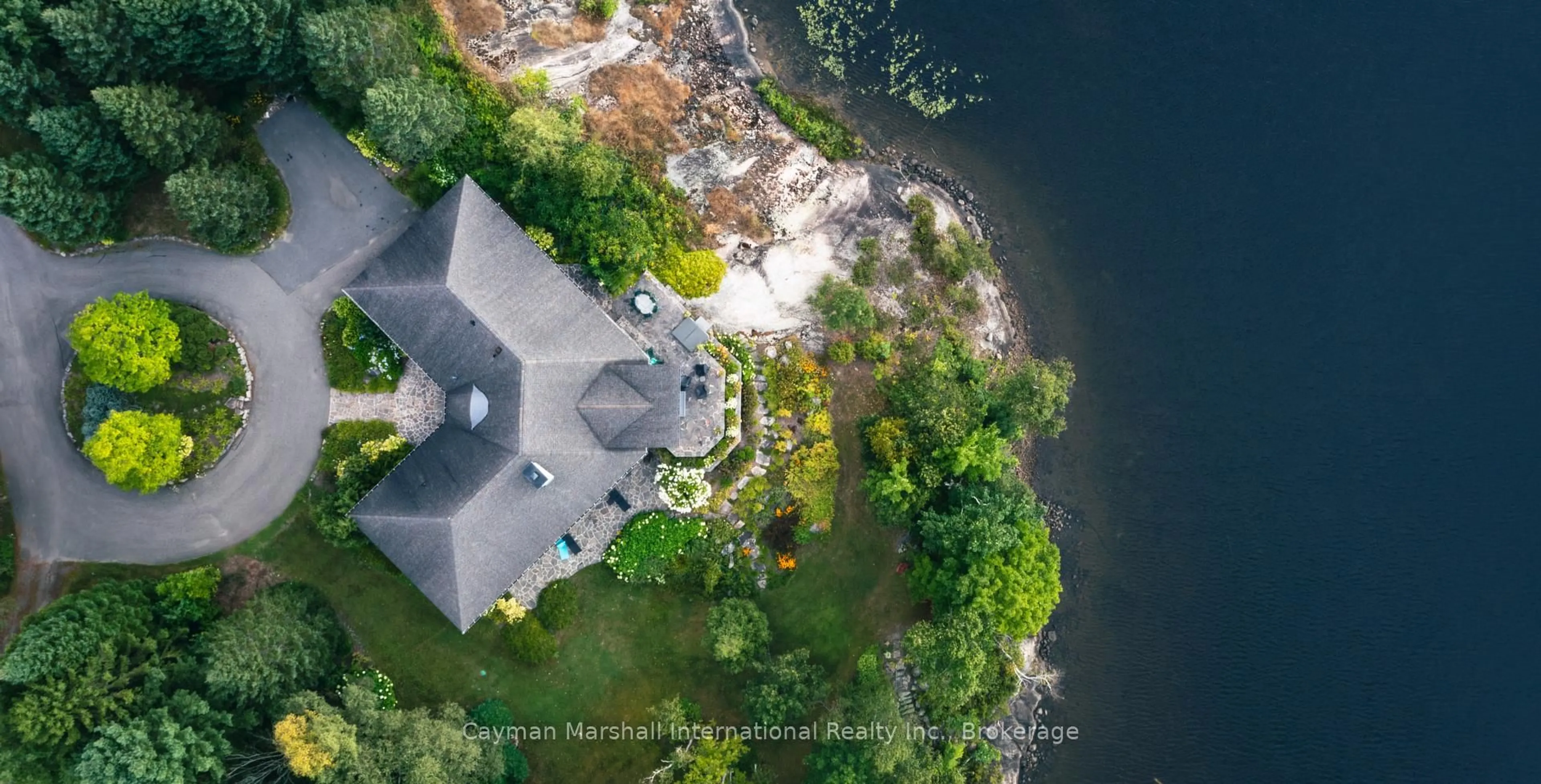A pic from outside/outdoor area/front of a property/back of a property/a pic from drone, water/lake/river/ocean view for 19 Cheers Lane, Seguin Ontario P2A 0B2