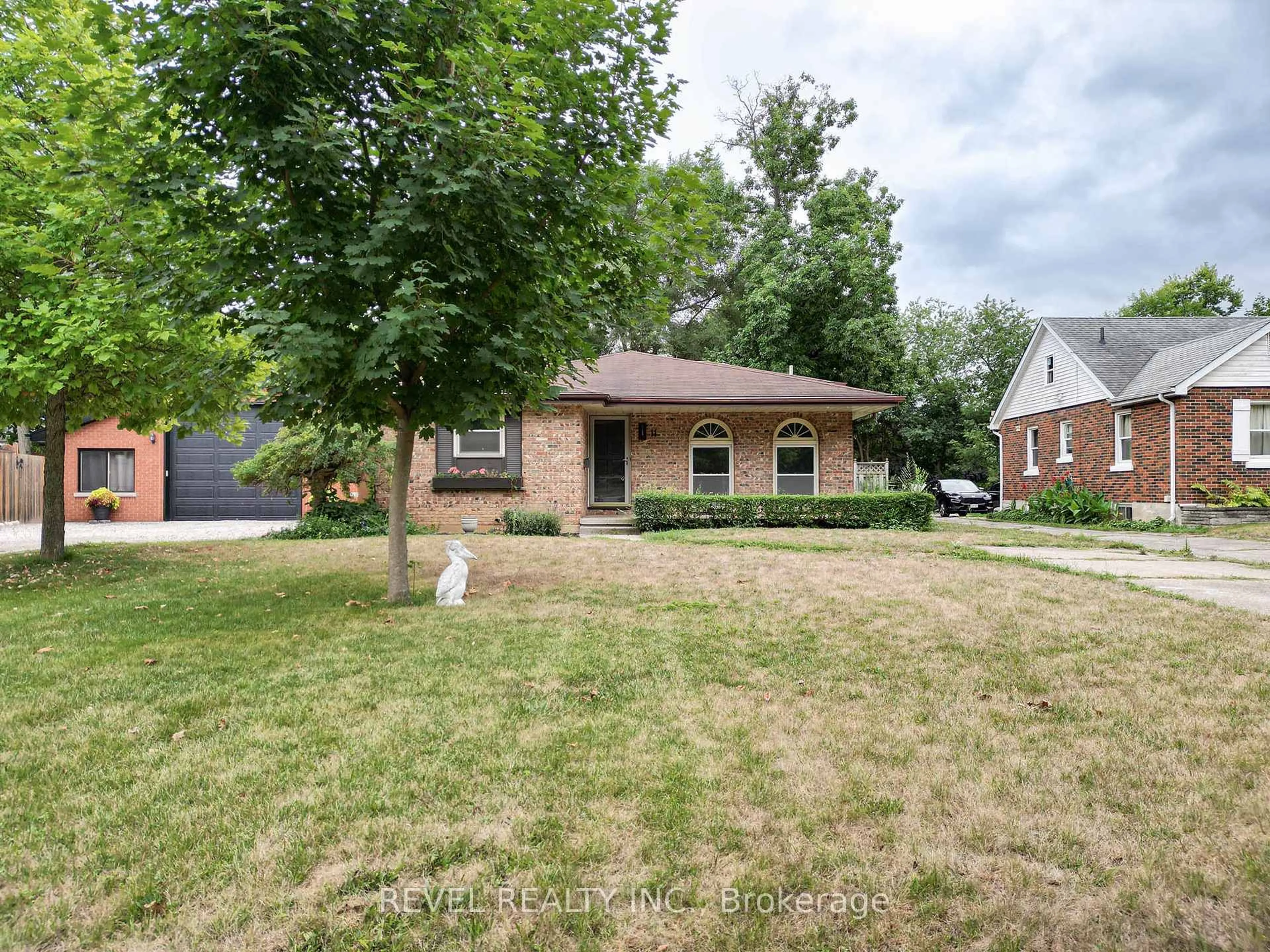 Home with brick exterior material, street for 11 Glenwood Dr, Brantford Ontario N3S 3E9