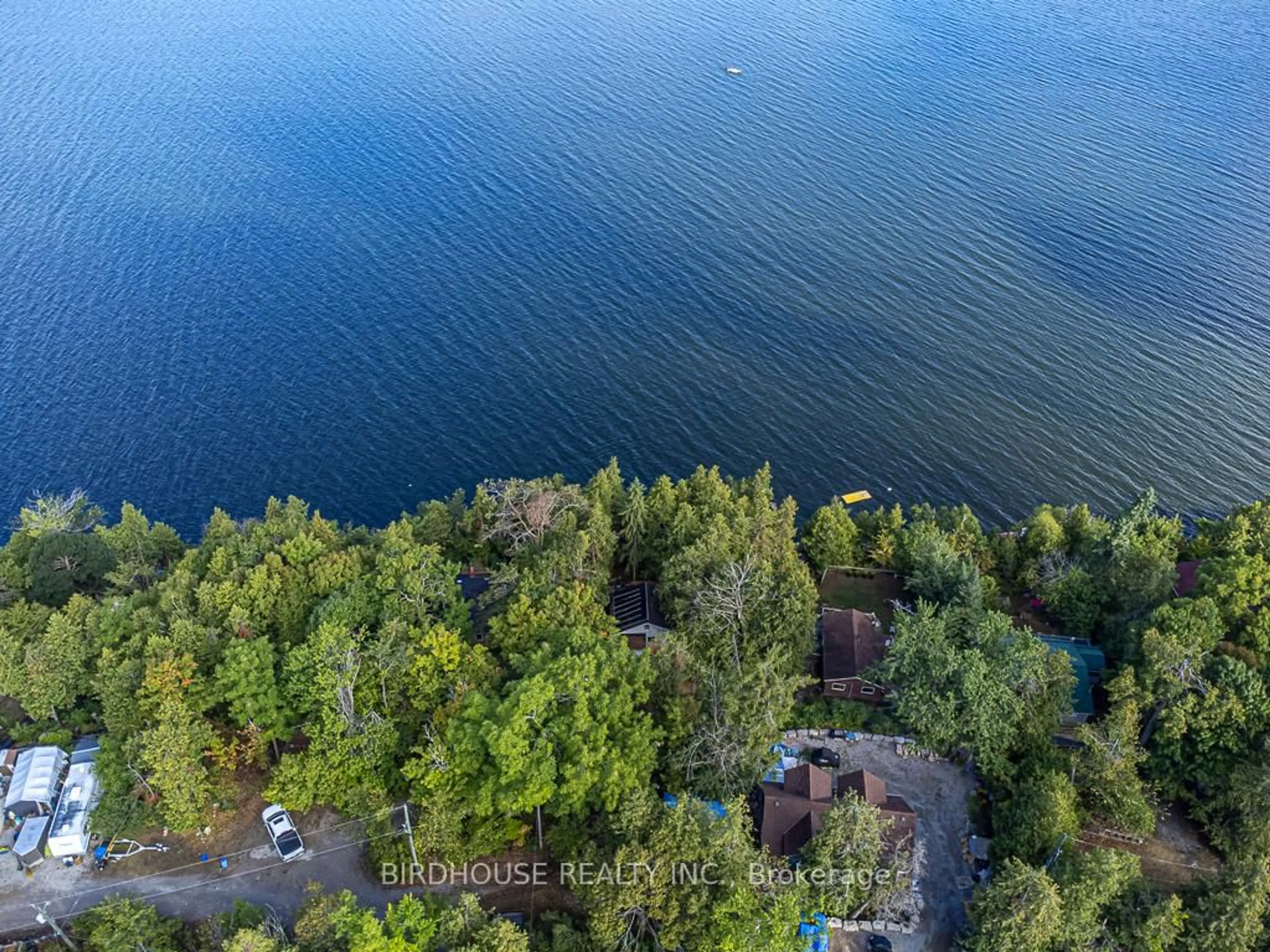 A pic from outside/outdoor area/front of a property/back of a property/a pic from drone, water/lake/river/ocean view for 32 Major St, Kawartha Lakes Ontario K0M 1L0