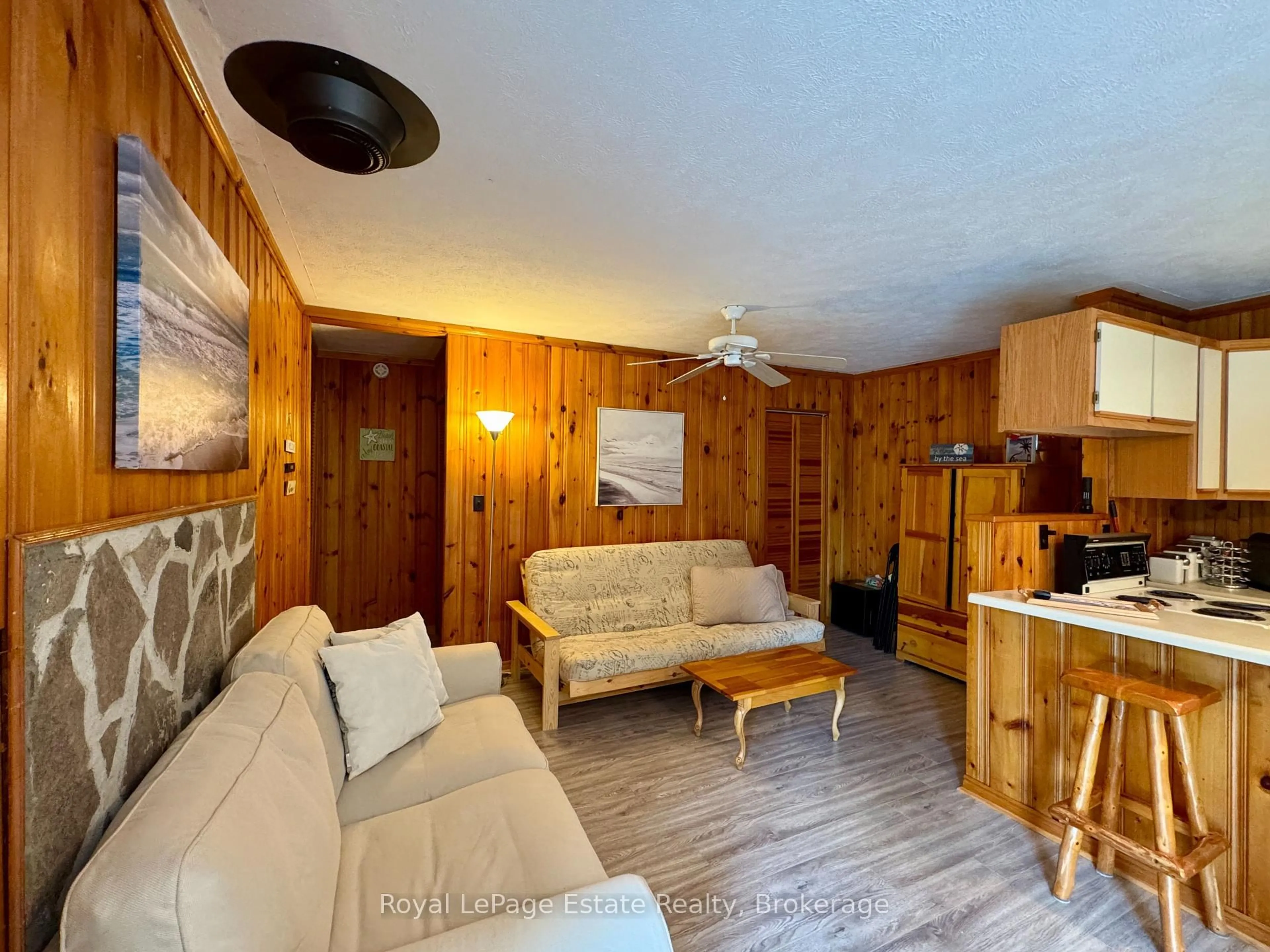 Living room with furniture, wood/laminate floor for 5 15th St, Native Leased Lands Ontario N0H 2G0