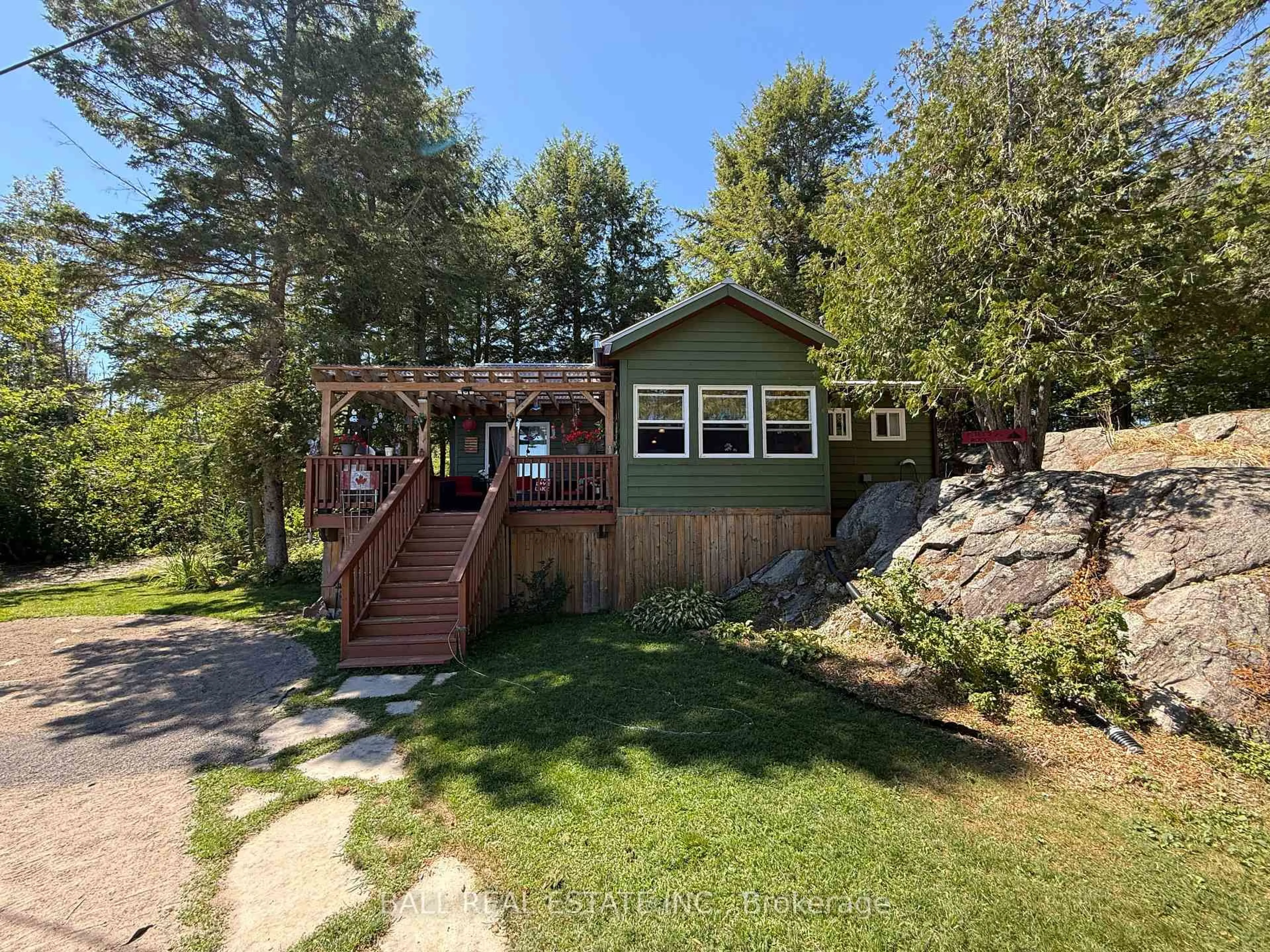 A pic from outside/outdoor area/front of a property/back of a property/a pic from drone, water/lake/river/ocean view for 194 Fire Route 45A, North Kawartha Ontario K0L 2H0