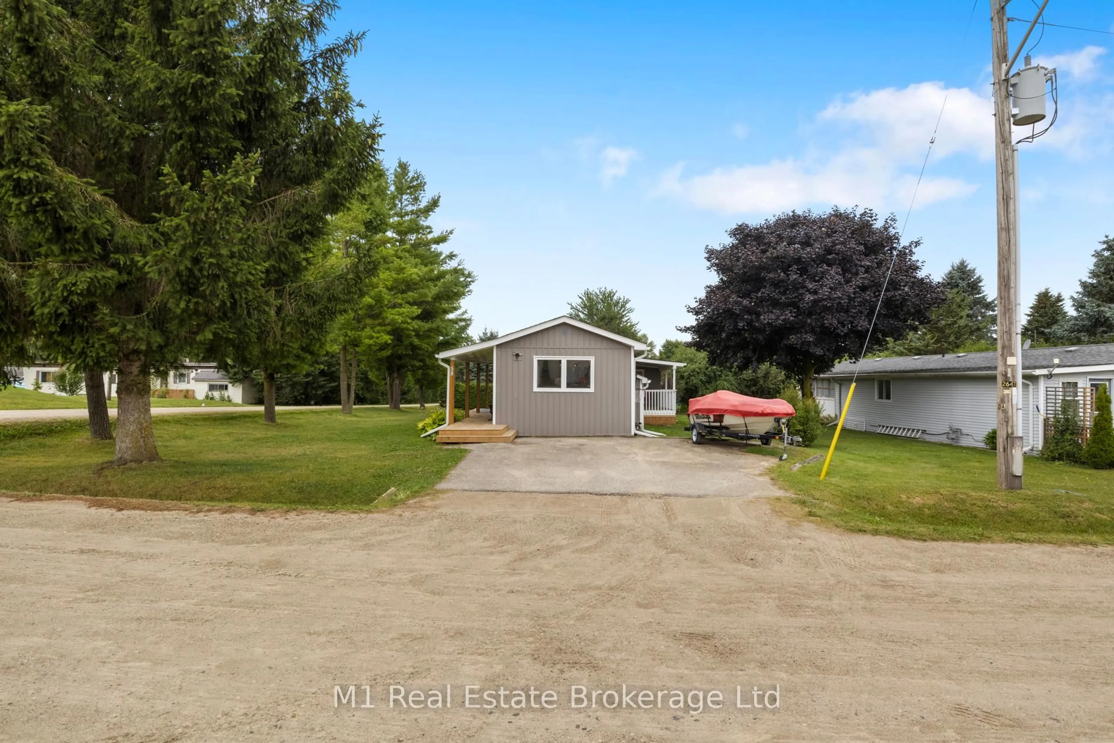 A pic from outside/outdoor area/front of a property/back of a property/a pic from drone, water/lake/river/ocean view for 58 2nd Ave, Wellington North Ontario N0G 2K0