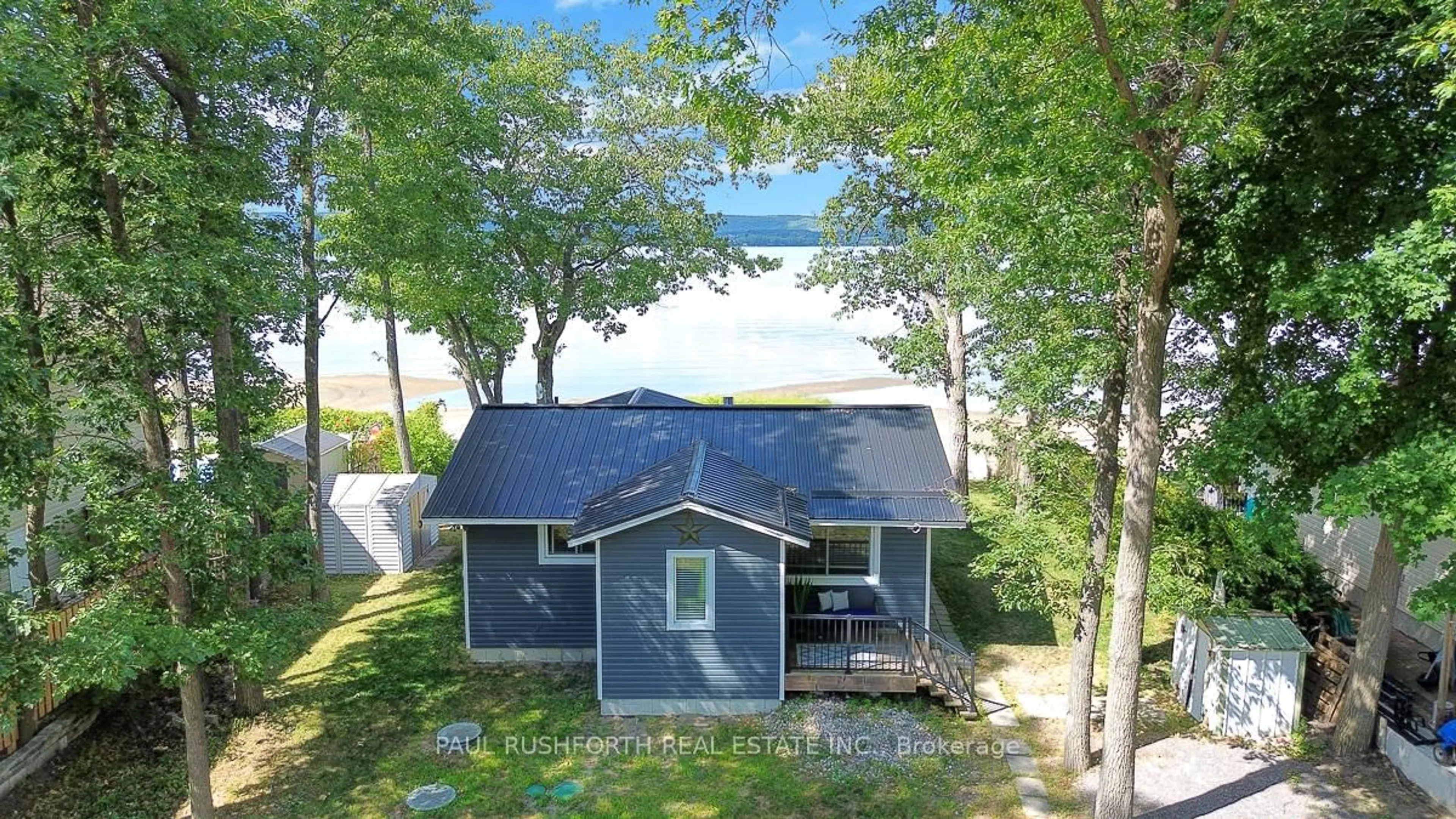 A pic from outside/outdoor area/front of a property/back of a property/a pic from drone, water/lake/river/ocean view for 728 Bayview Dr, Ottawa Ontario K0A 3M0
