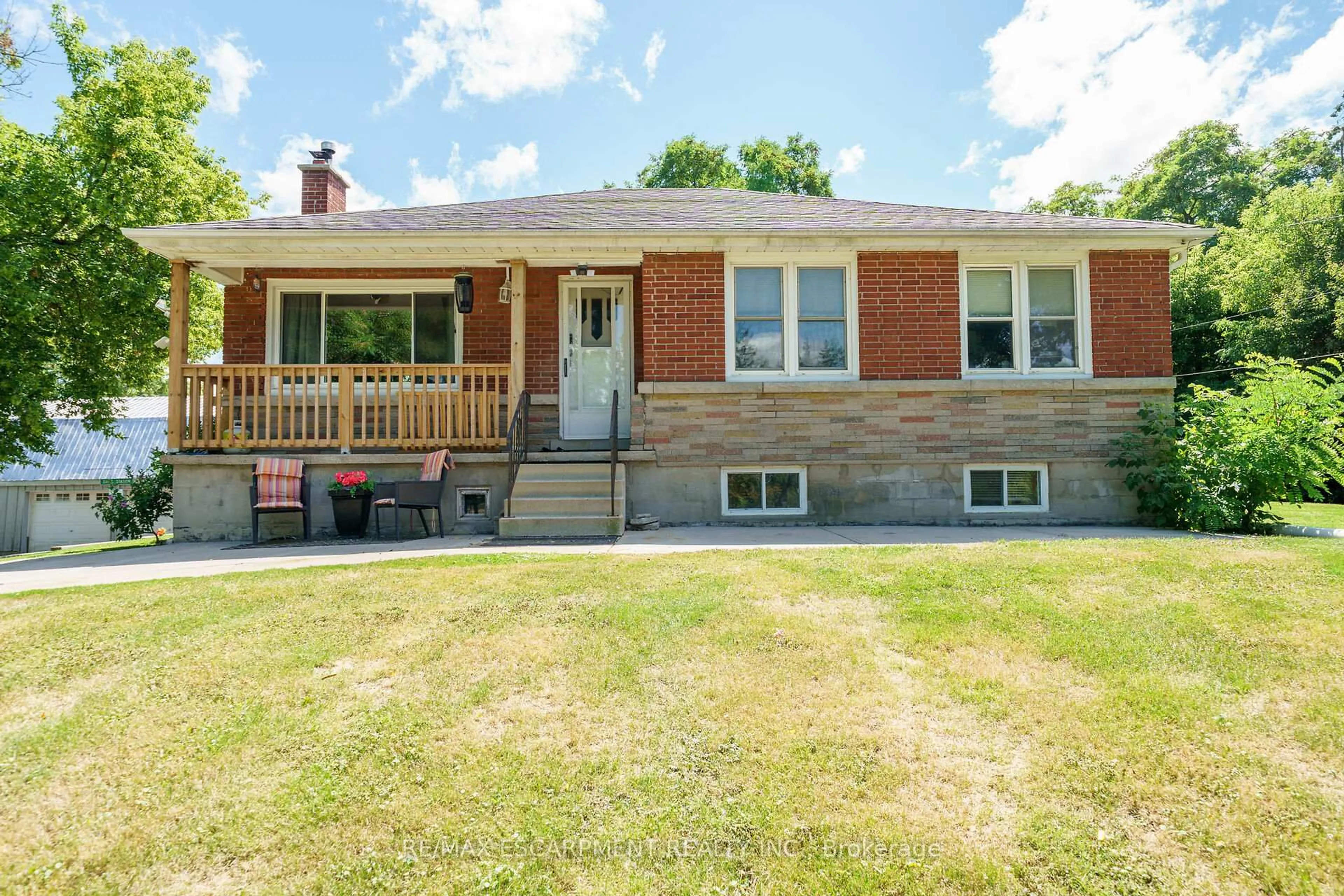 Home with brick exterior material, street for 226 Carluke Rd, Hamilton Ontario L9G 3L1