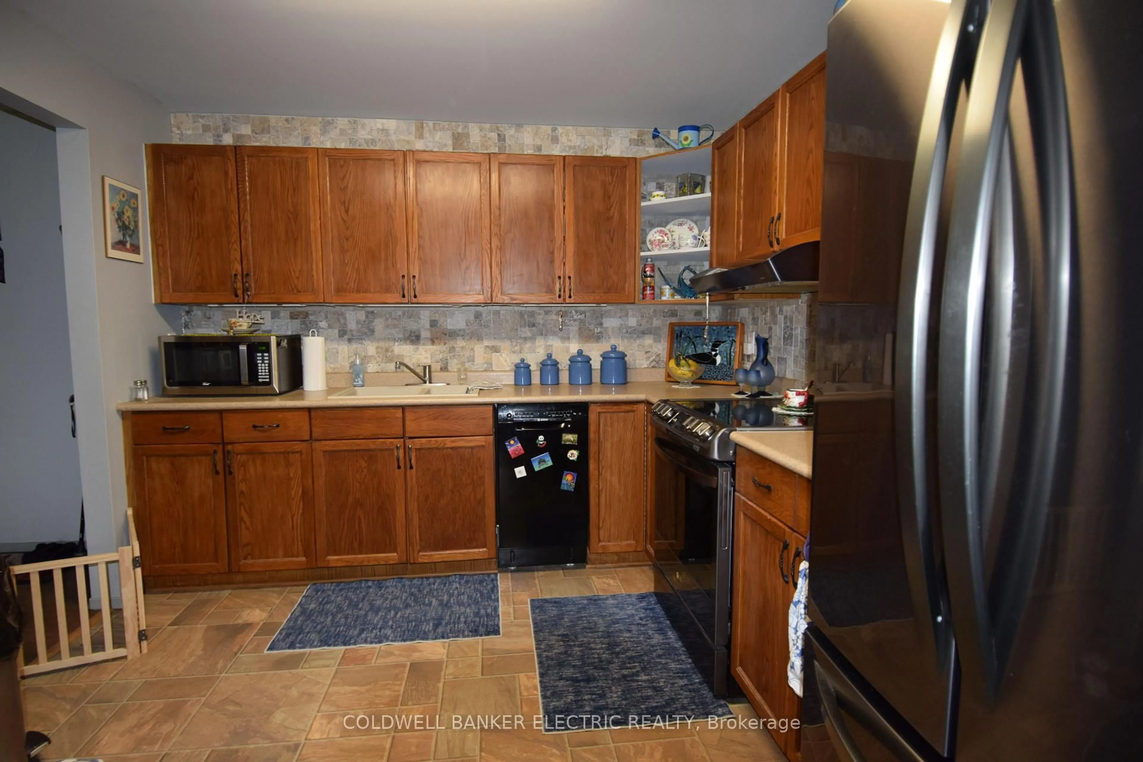 Standard kitchen, ceramic/tile floor for 2418 Mountland Dr #104, Peterborough Ontario K9K 2E2