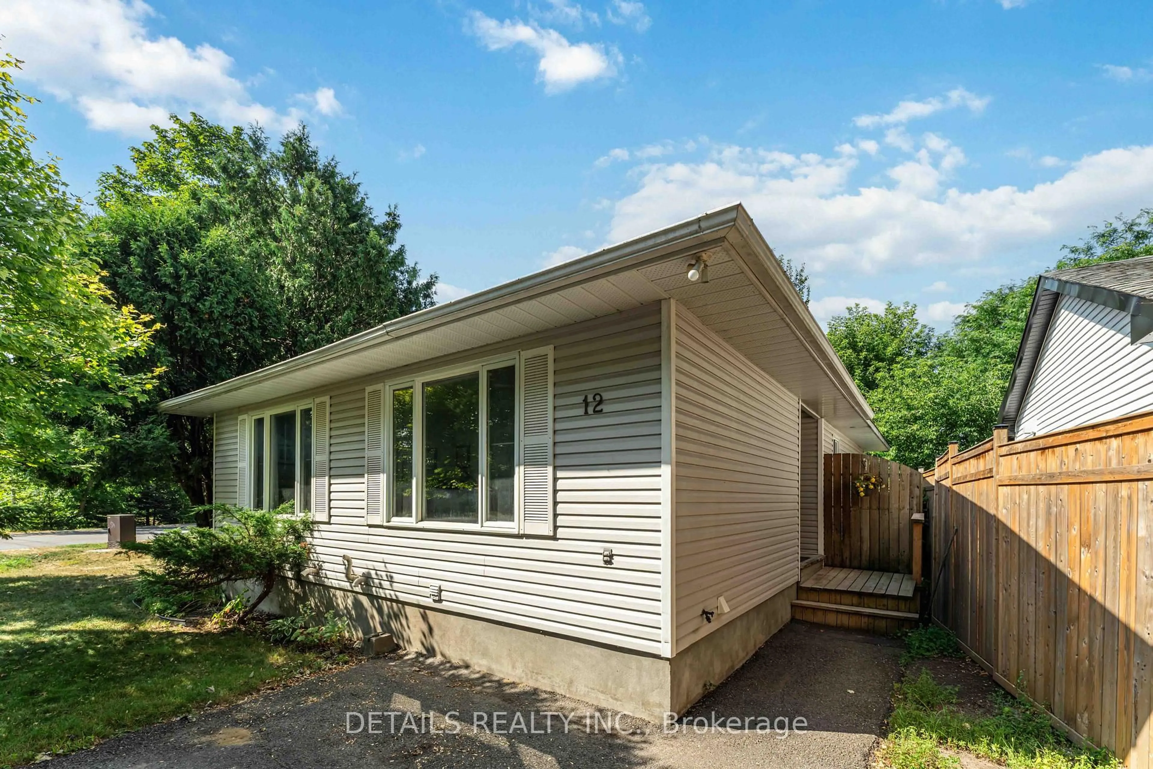 Home with vinyl exterior material, street for 12 Henry Goulburn Way, Stittsville Ontario K2S 1N9