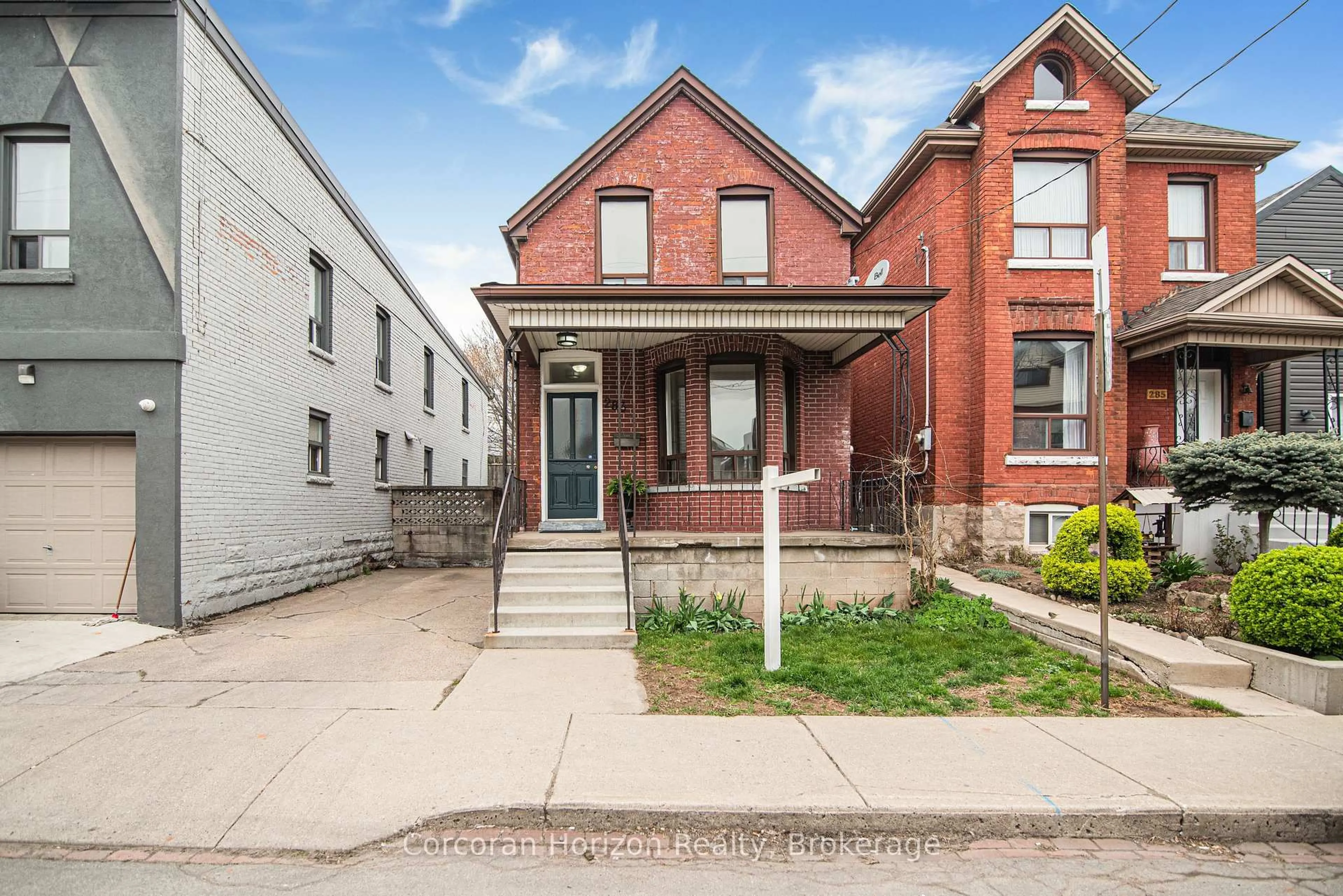 Home with brick exterior material, street for 283 Emerald St, Hamilton Ontario L8L 5L2