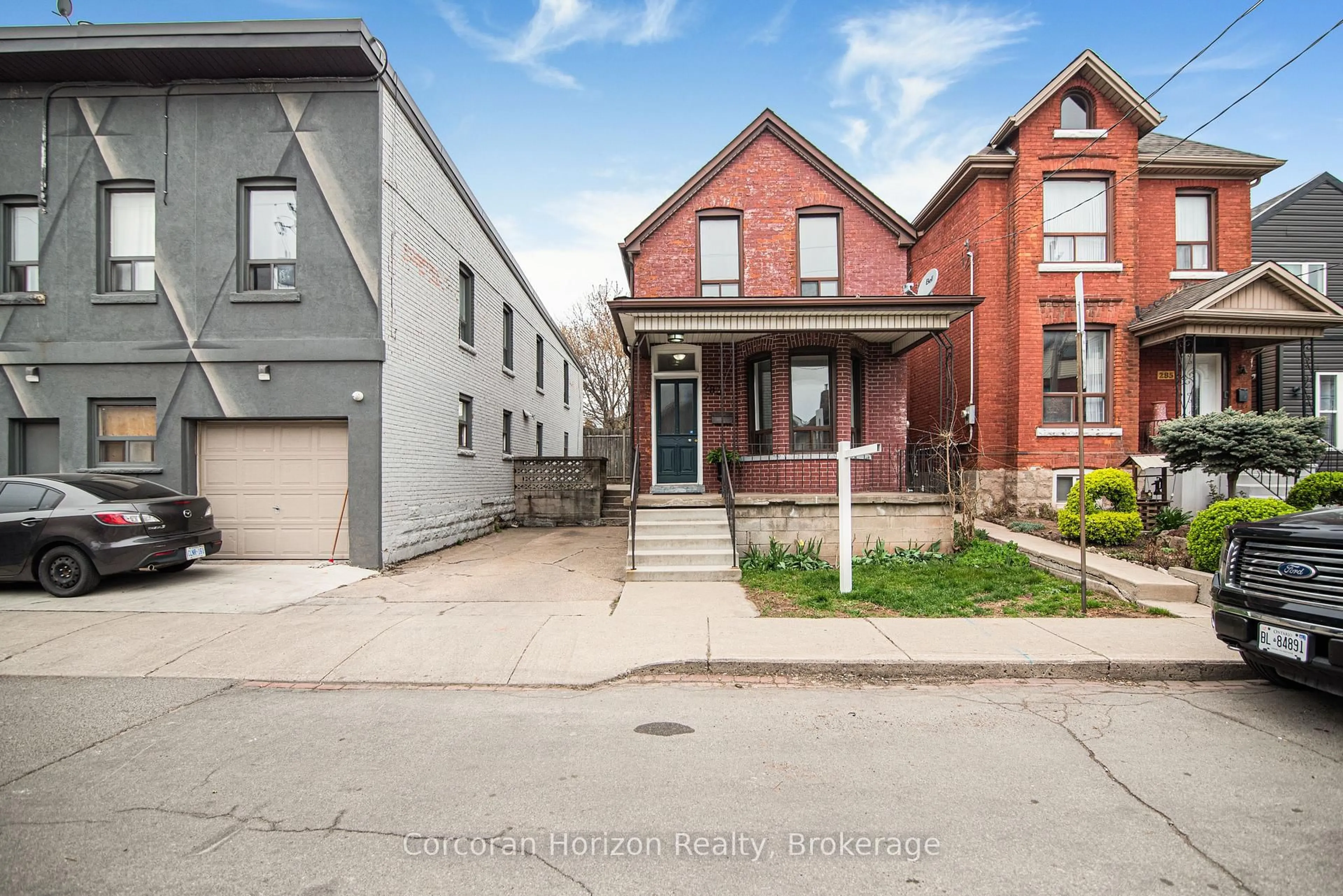 Home with brick exterior material, street for 283 Emerald St, Hamilton Ontario L8L 5L2