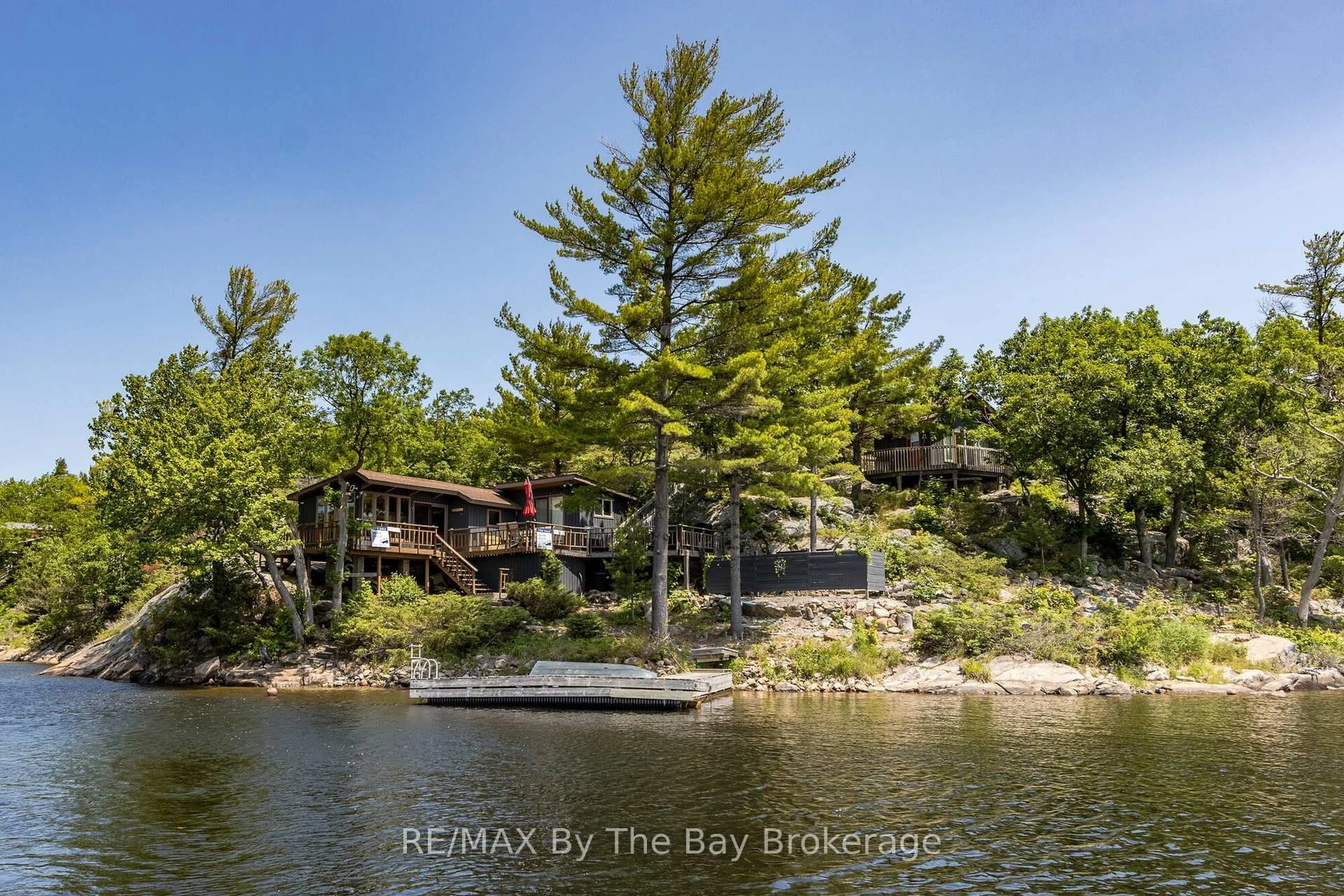 A pic from outside/outdoor area/front of a property/back of a property/a pic from drone, water/lake/river/ocean view for 1518 Island 1040, Georgian Bay Ontario P0E 1E0