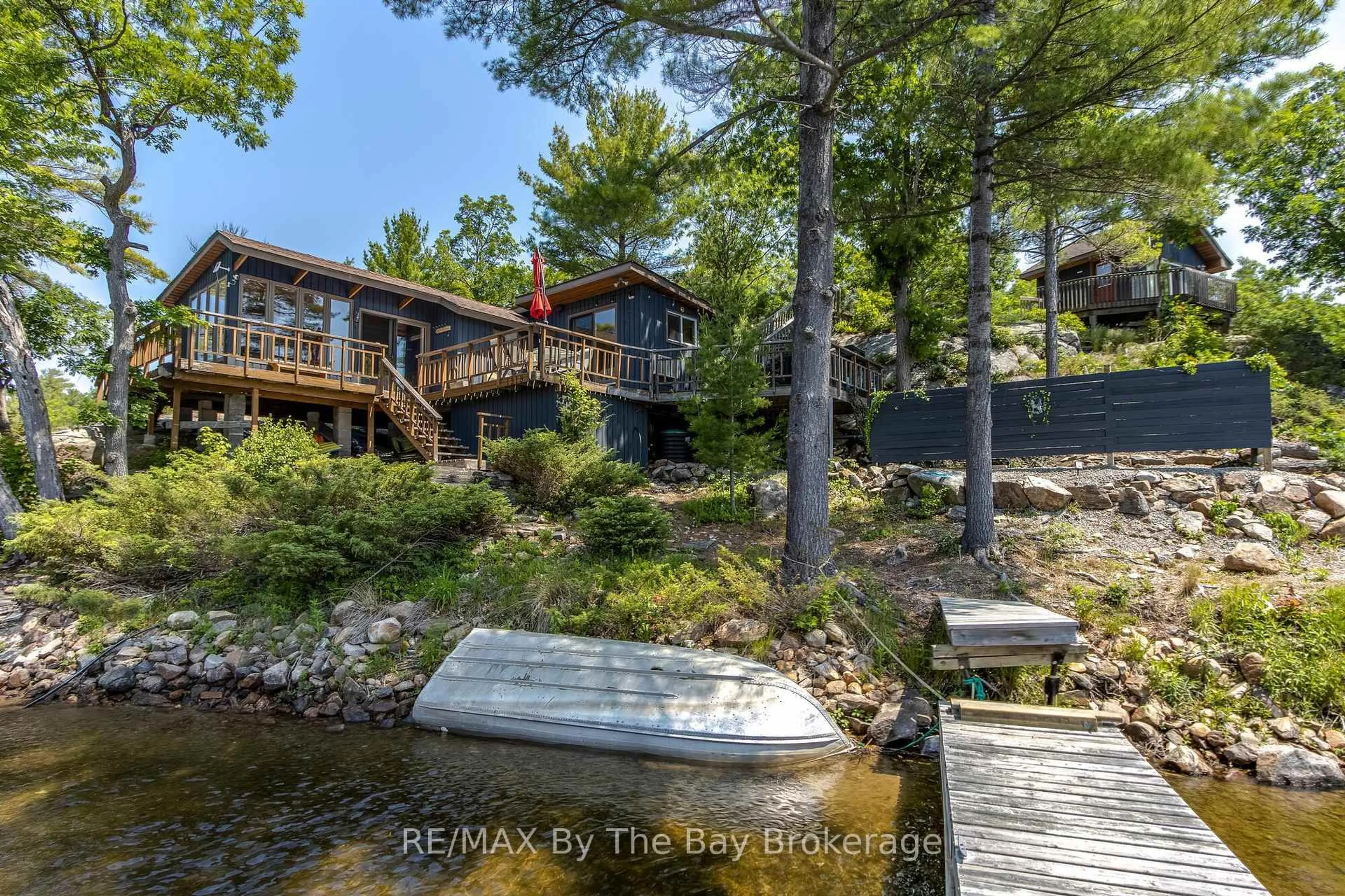 A pic from outside/outdoor area/front of a property/back of a property/a pic from drone, water/lake/river/ocean view for 1518 Island 1040, Georgian Bay Ontario P0E 1E0