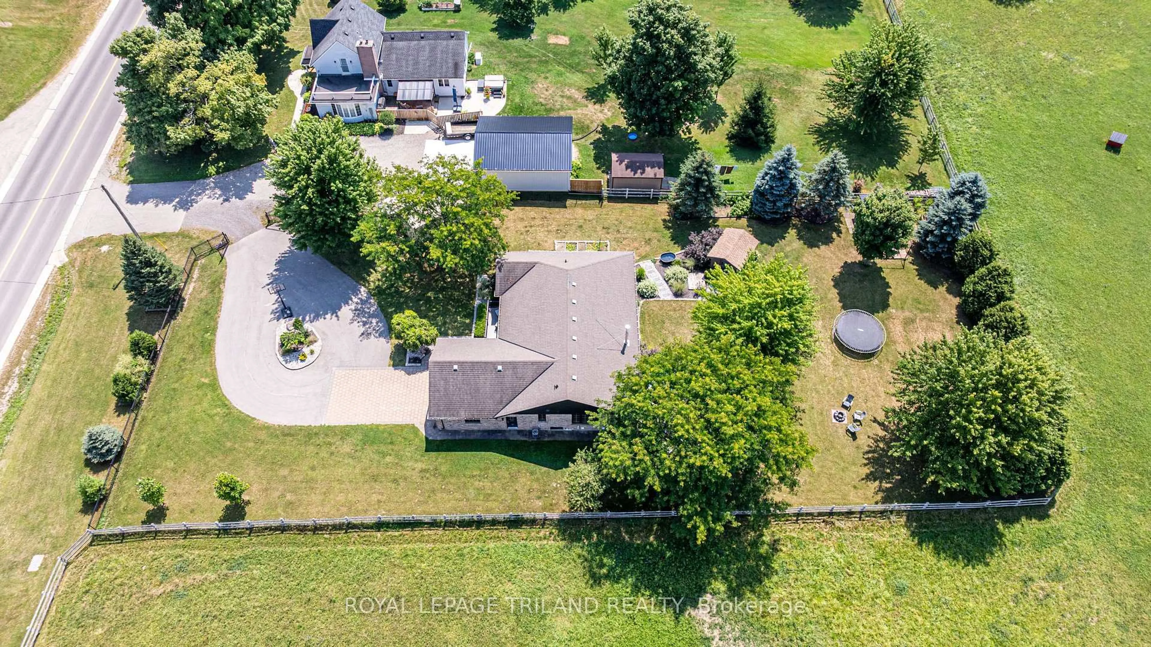 A pic from outside/outdoor area/front of a property/back of a property/a pic from drone, street for 3921 Elgin Rd, Thames Centre Ontario N0L 1V0