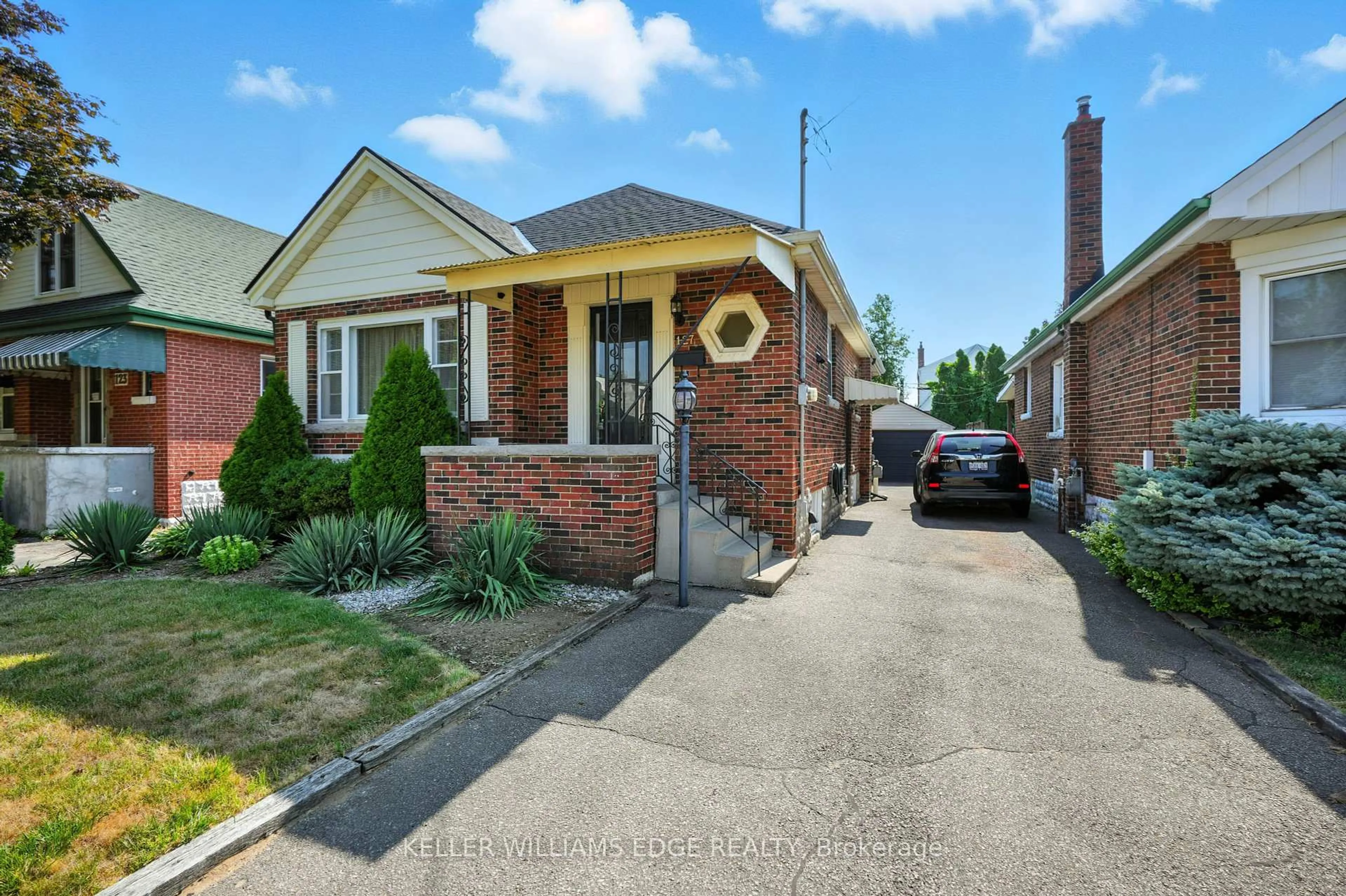 Home with brick exterior material, street for 127 Garside Ave, Hamilton Ontario L8K 2W1