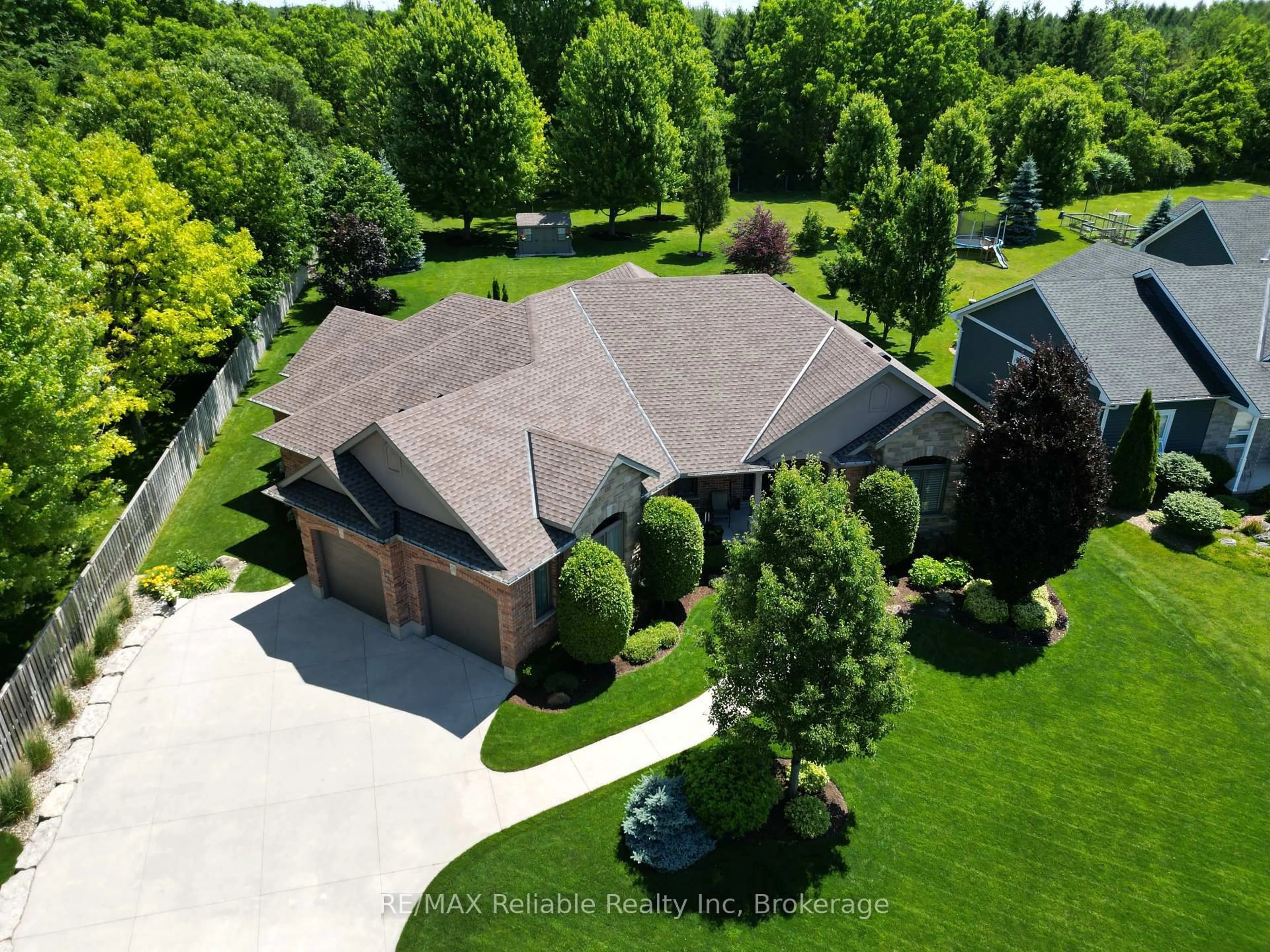 A pic from outside/outdoor area/front of a property/back of a property/a pic from drone, street for 24 Carriage Lane, Bluewater Ontario N0M 1G0