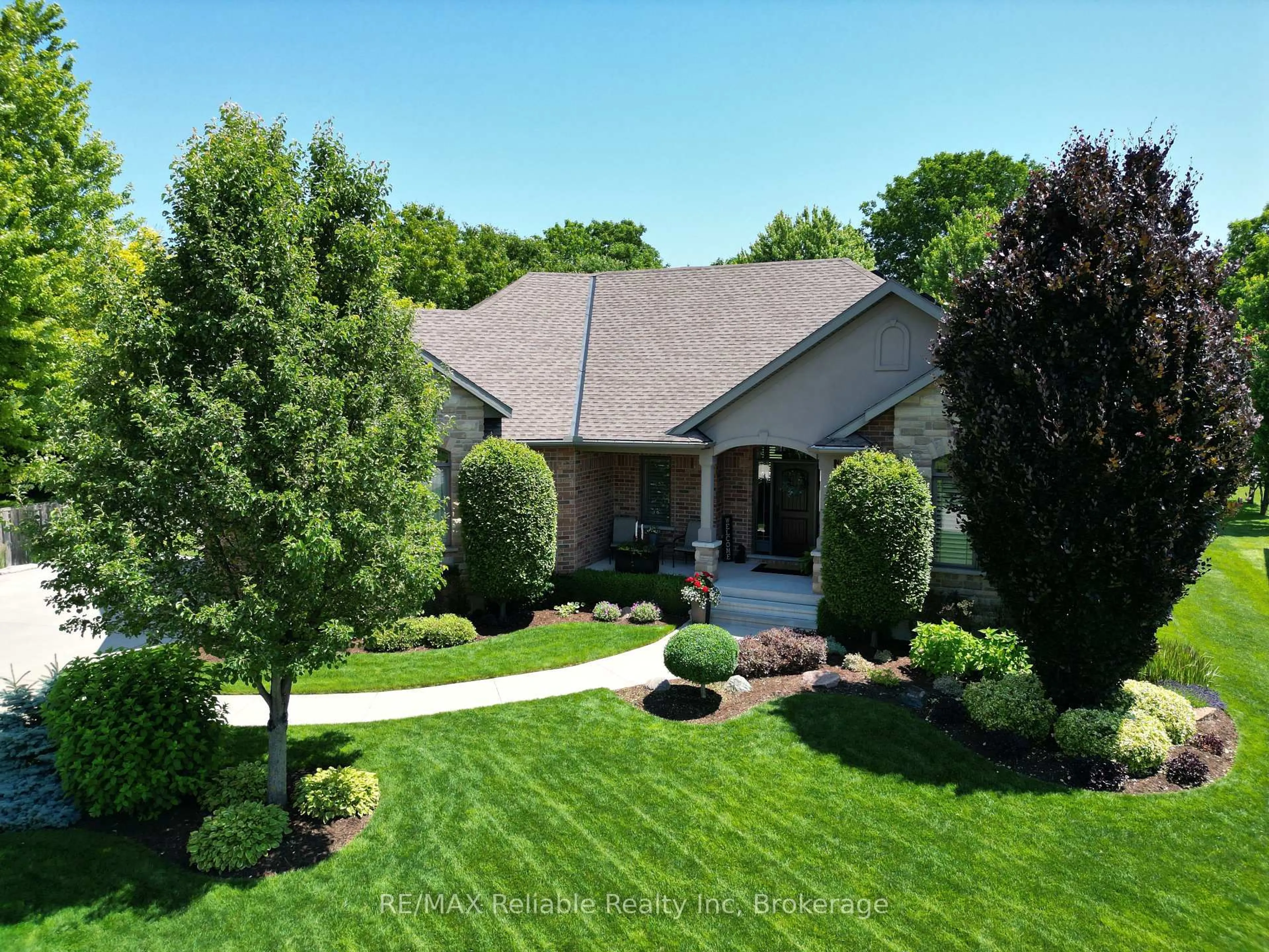 A pic from outside/outdoor area/front of a property/back of a property/a pic from drone, street for 24 Carriage Lane, Bluewater Ontario N0M 1G0