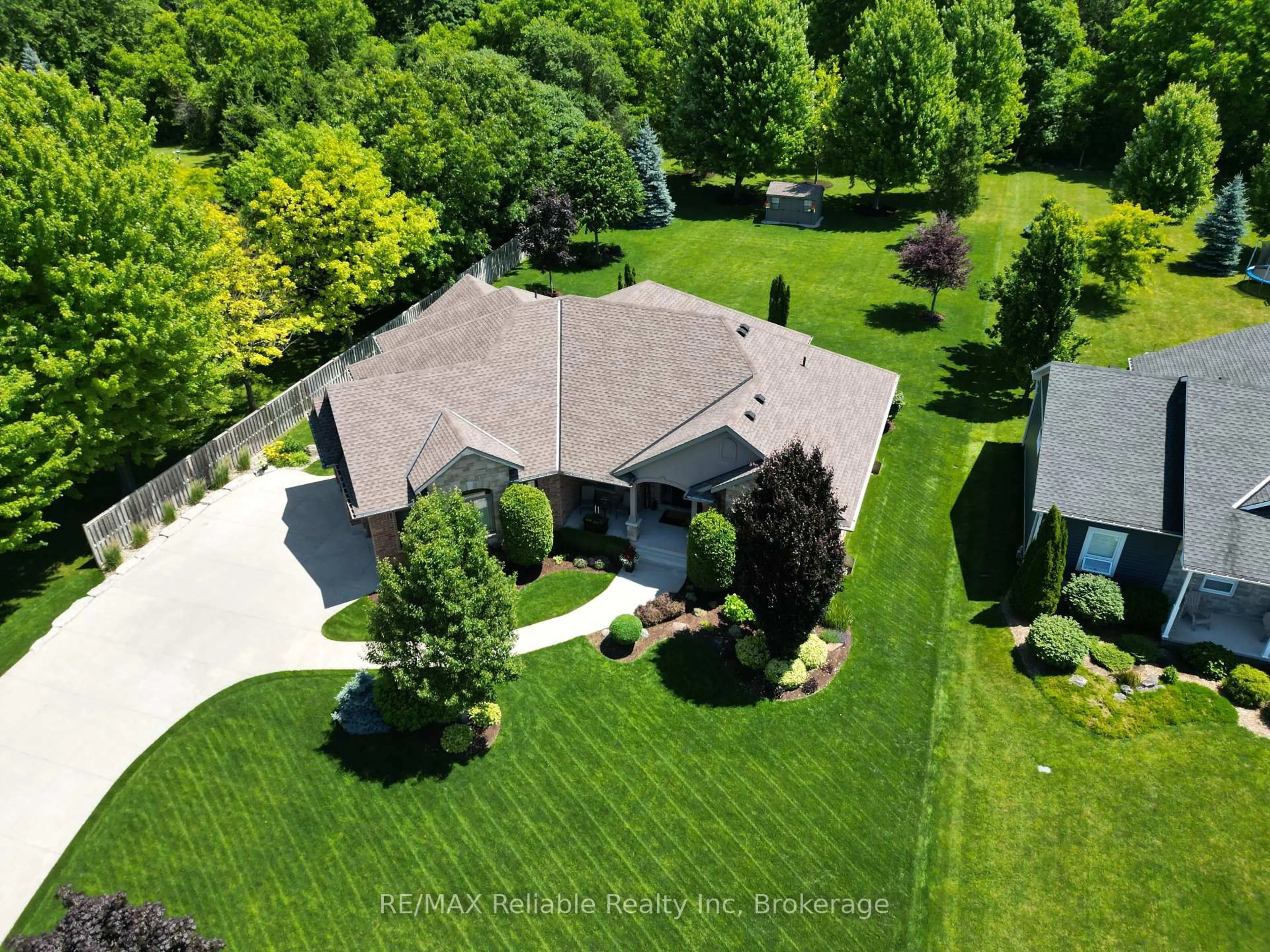 A pic from outside/outdoor area/front of a property/back of a property/a pic from drone, street for 24 Carriage Lane, Bluewater Ontario N0M 1G0