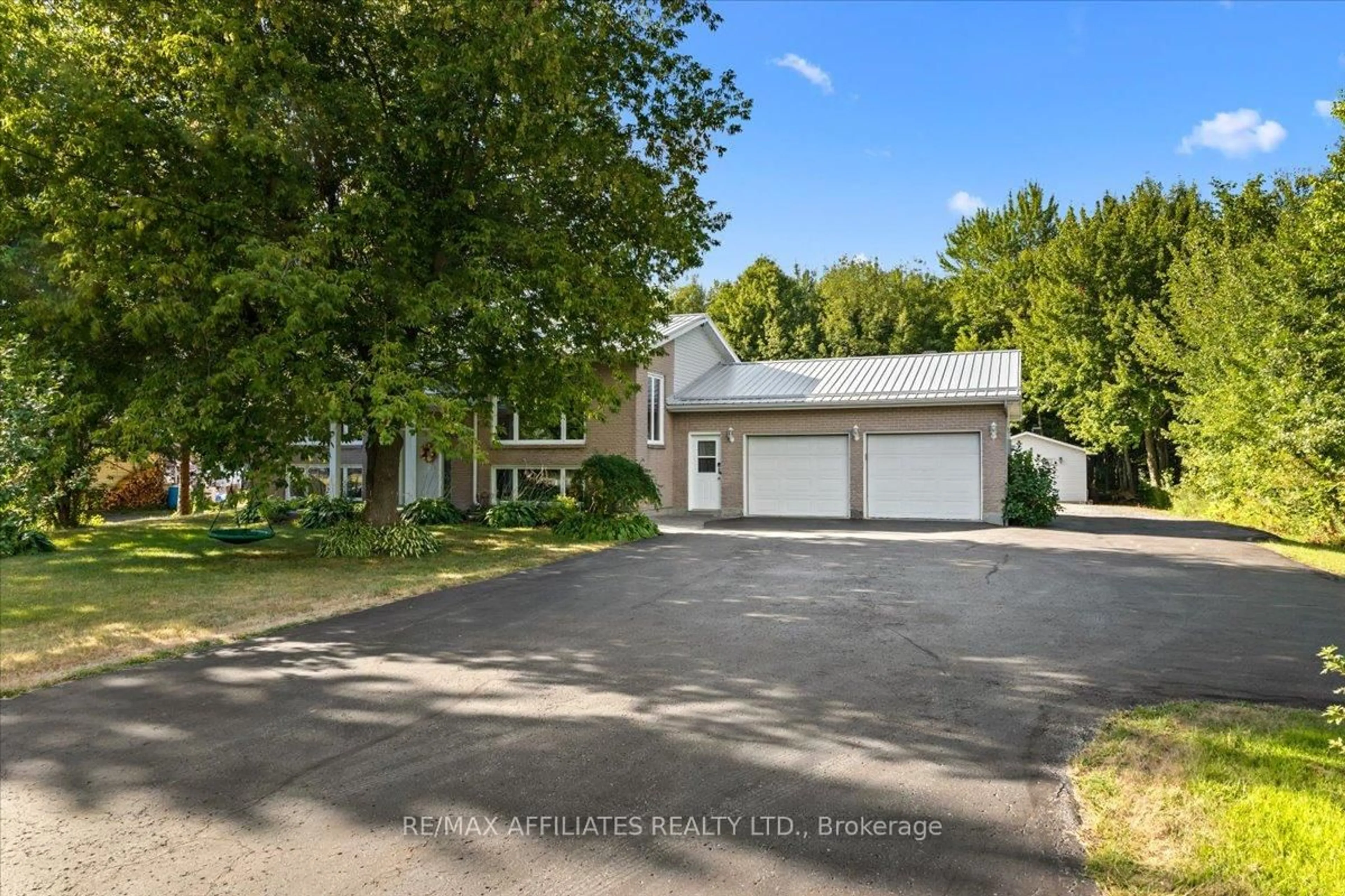 A pic from outside/outdoor area/front of a property/back of a property/a pic from drone, street for 2144 Route 500 Rd, The Nation Ontario K0A 1W0
