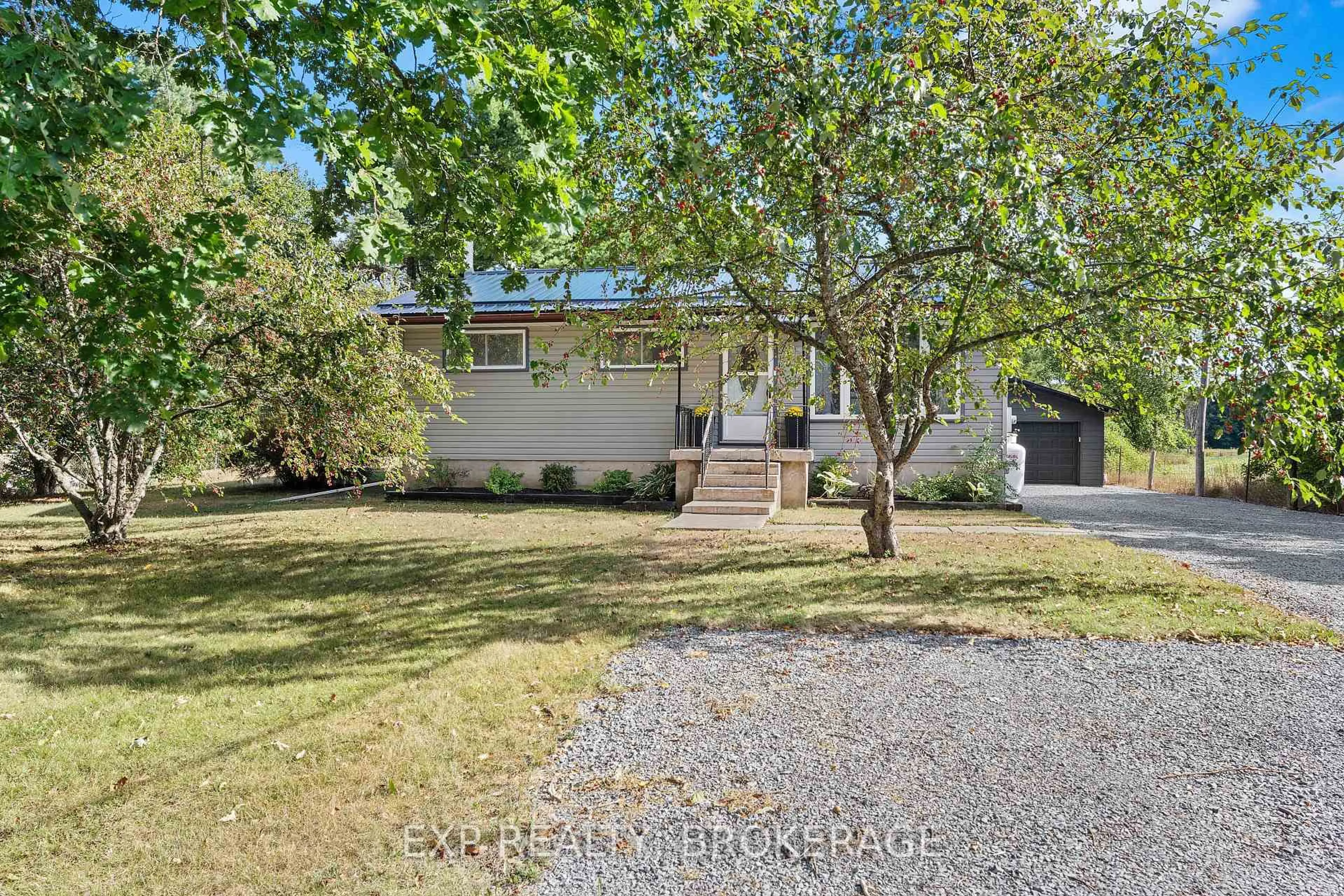 A pic from outside/outdoor area/front of a property/back of a property/a pic from drone, street for 3858 QUINN Rd, Harrowsmith Ontario K0H 1V0